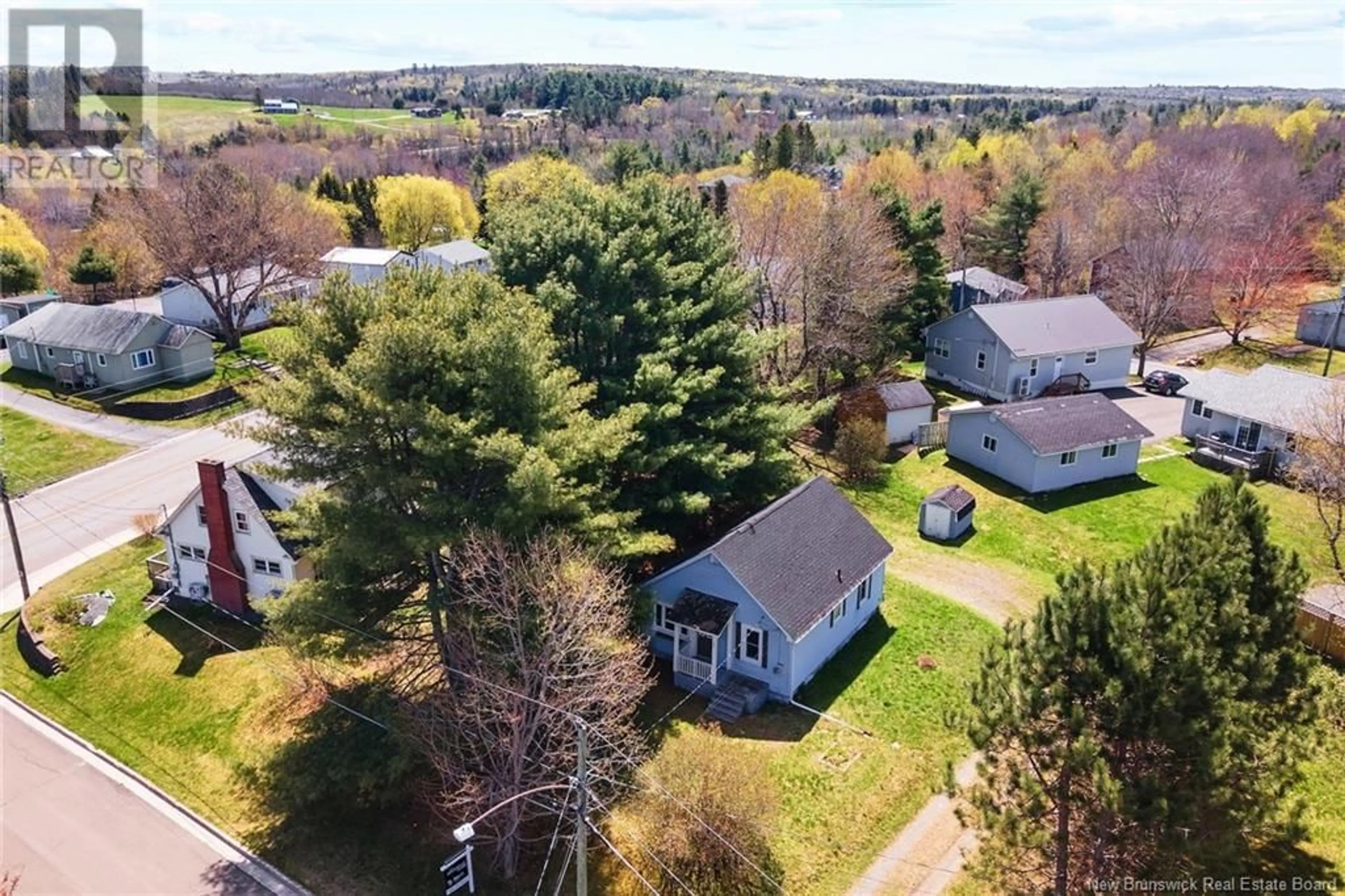 A pic from outside/outdoor area/front of a property/back of a property/a pic from drone, unknown for 5 MCKINLEY AVENUE, Fredericton New Brunswick E3A4R3