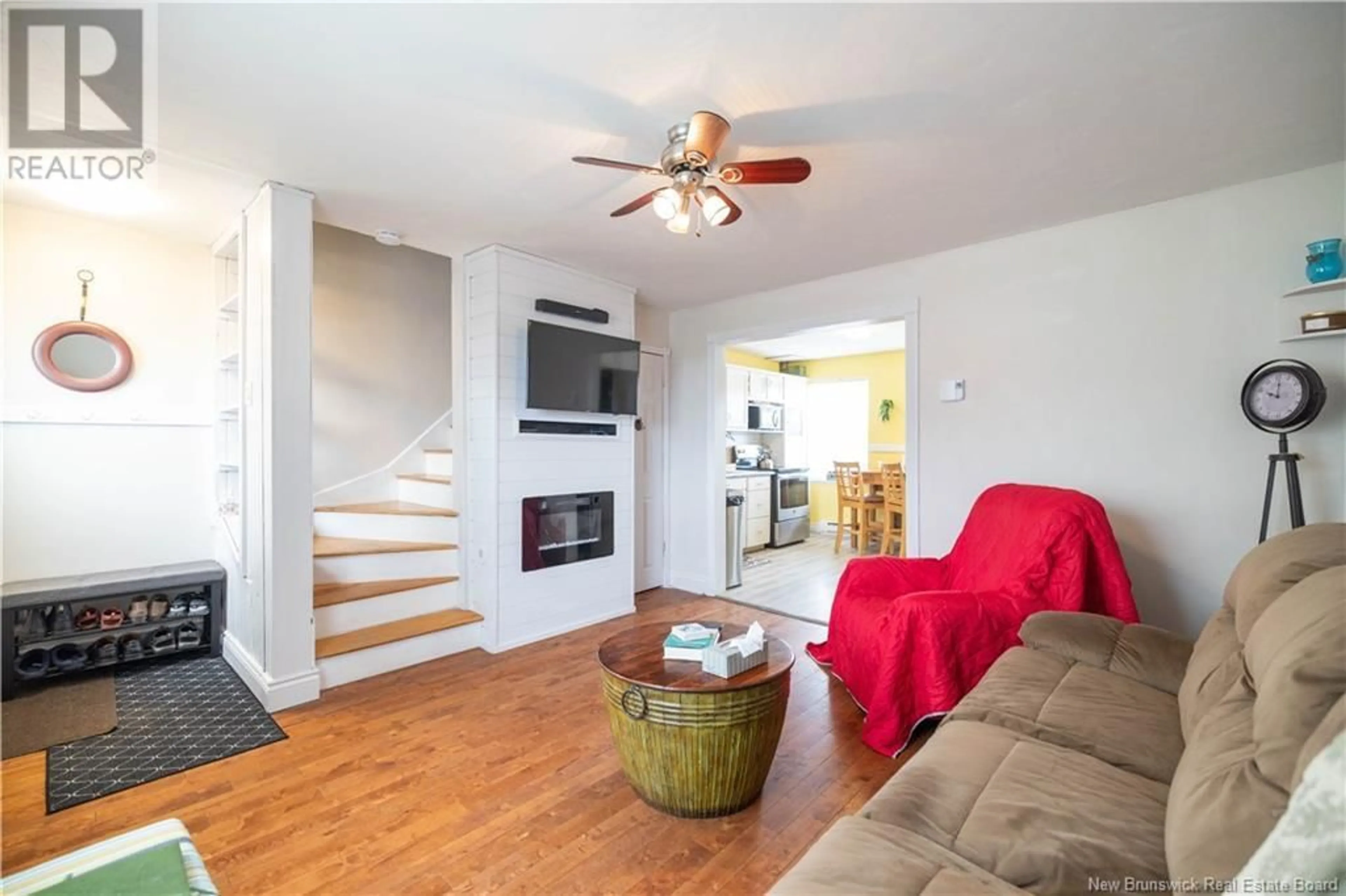 Living room with furniture, wood/laminate floor for 8 MCKENNA CRESCENT, Saint John New Brunswick E2K4E1
