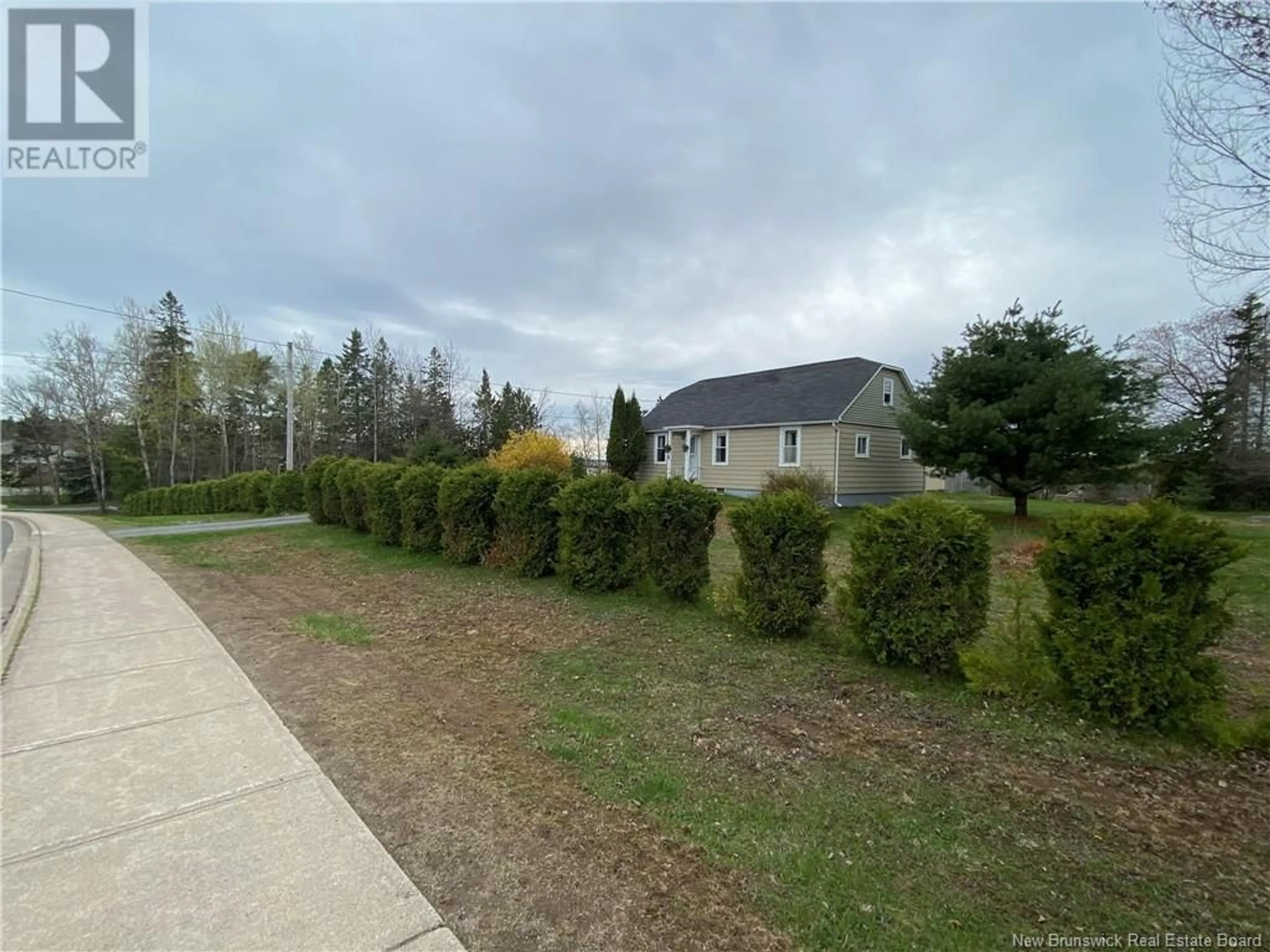 A pic from outside/outdoor area/front of a property/back of a property/a pic from drone, forest/trees view for 11 LILA COURT, Quispamsis New Brunswick E2E3R5