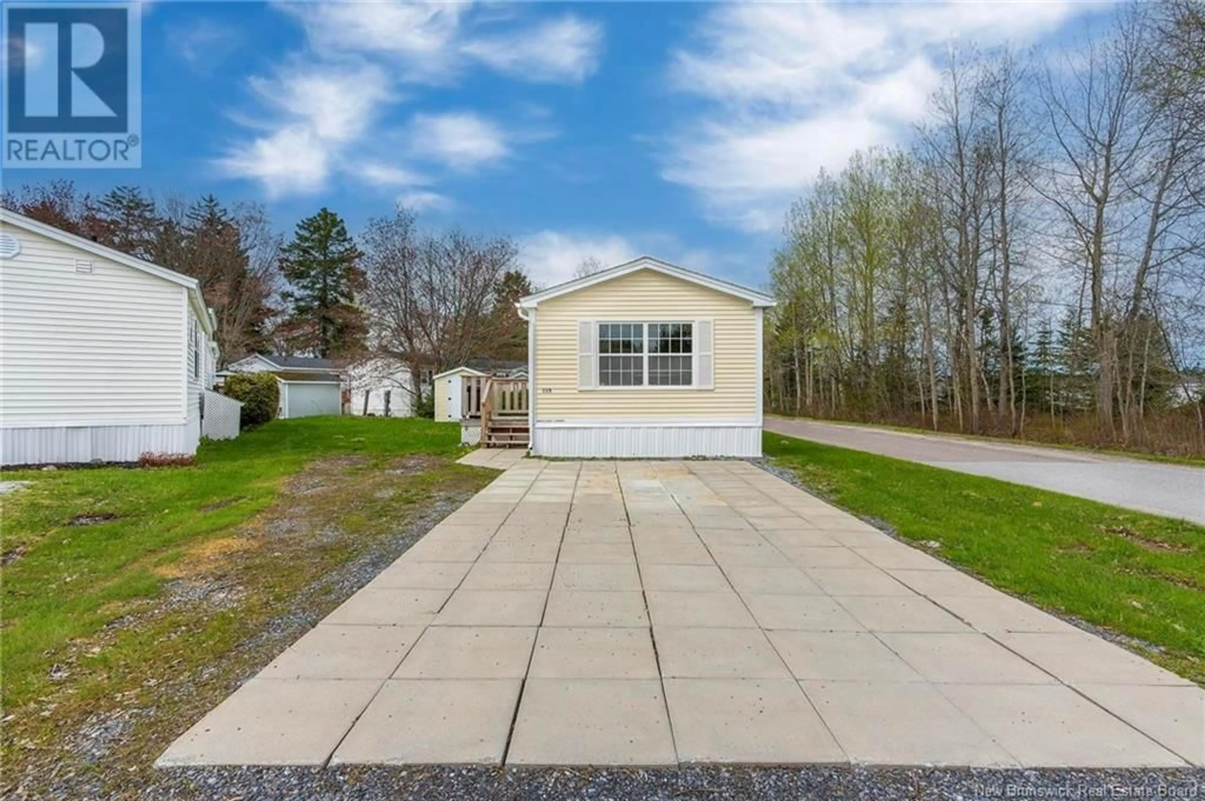 A pic from outside/outdoor area/front of a property/back of a property/a pic from drone, street for 115 ELM LANE, Quispamsis New Brunswick E2G1T5