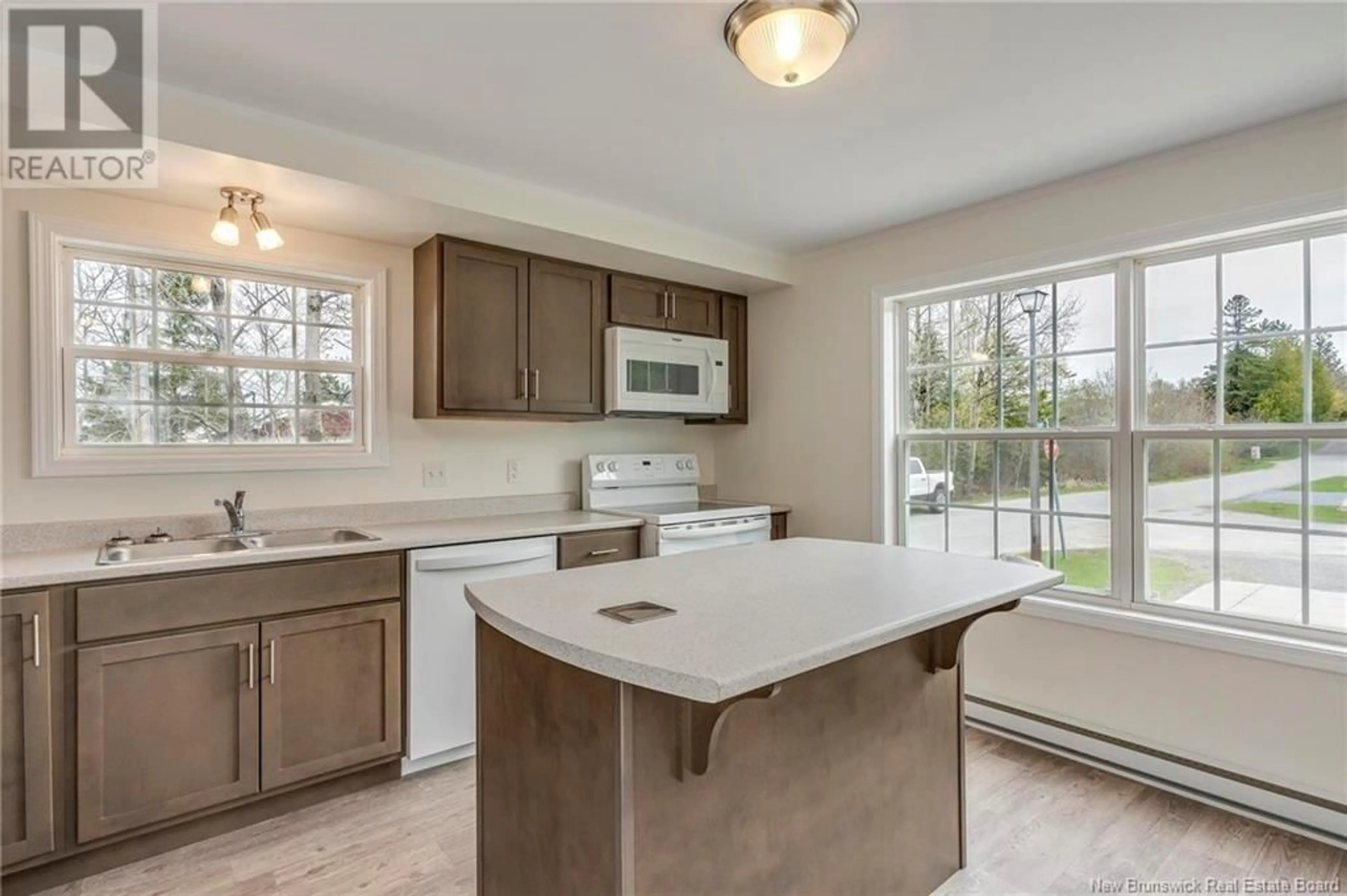 Open concept kitchen, ceramic/tile floor for 115 ELM LANE, Quispamsis New Brunswick E2G1T5
