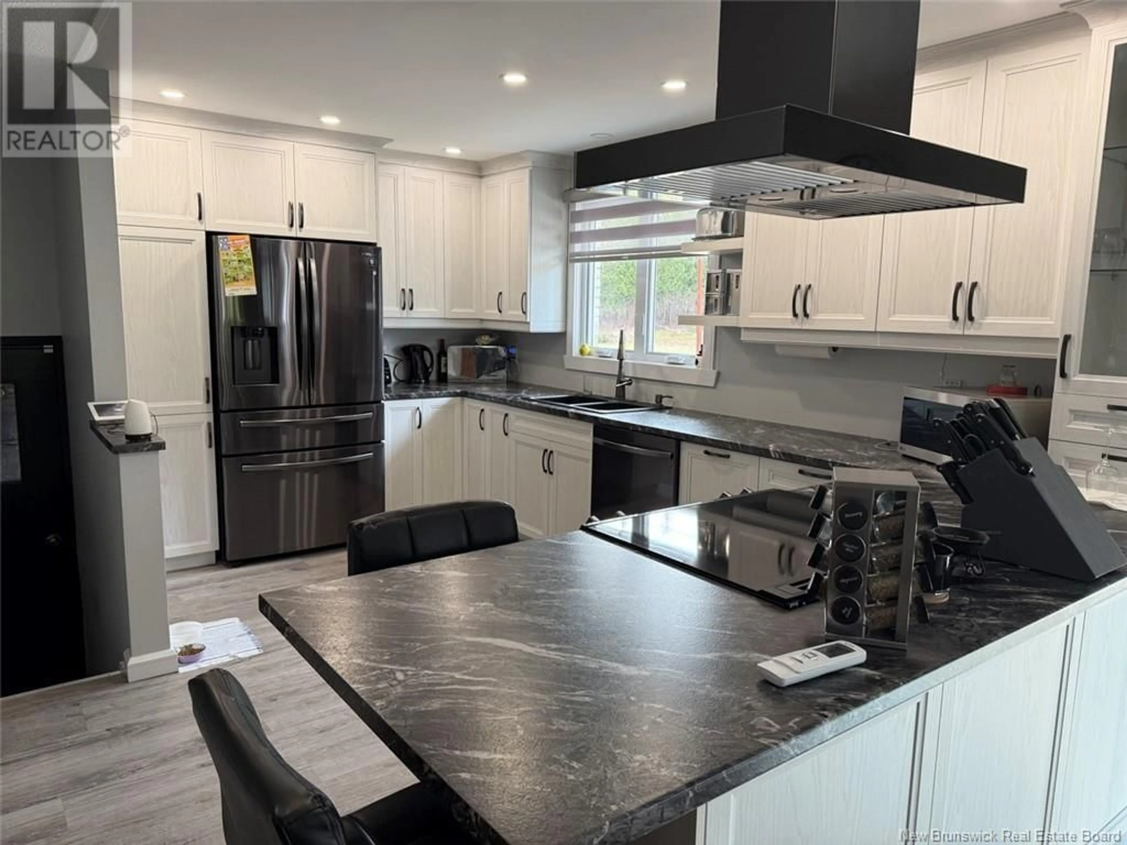 Open concept kitchen, ceramic/tile floor for 111 ROUTE 260, Saint-Quentin New Brunswick E8A2L5