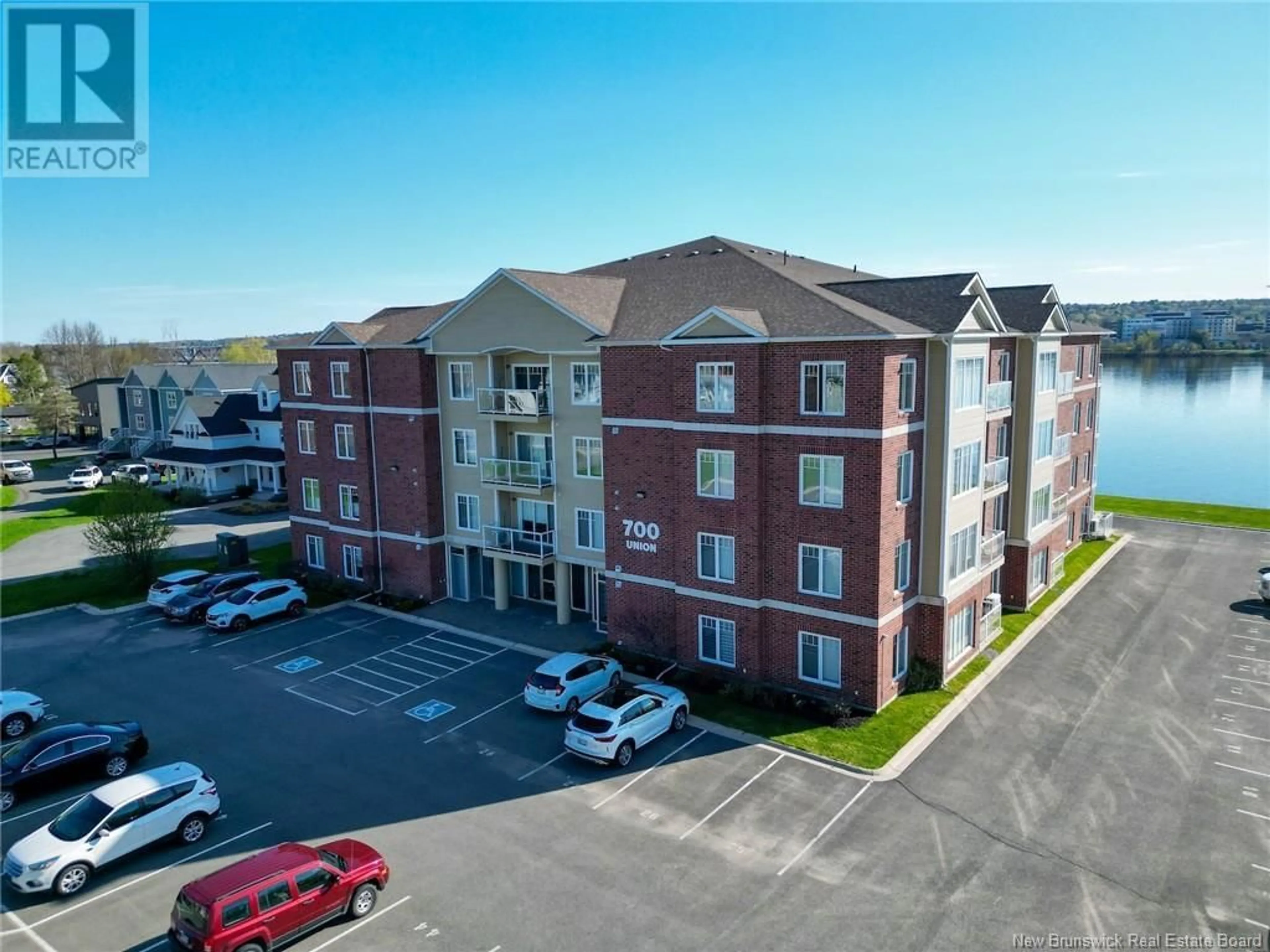 A pic from outside/outdoor area/front of a property/back of a property/a pic from drone, building for 106 - 700 UNION STREET, Devon New Brunswick E3A3N7