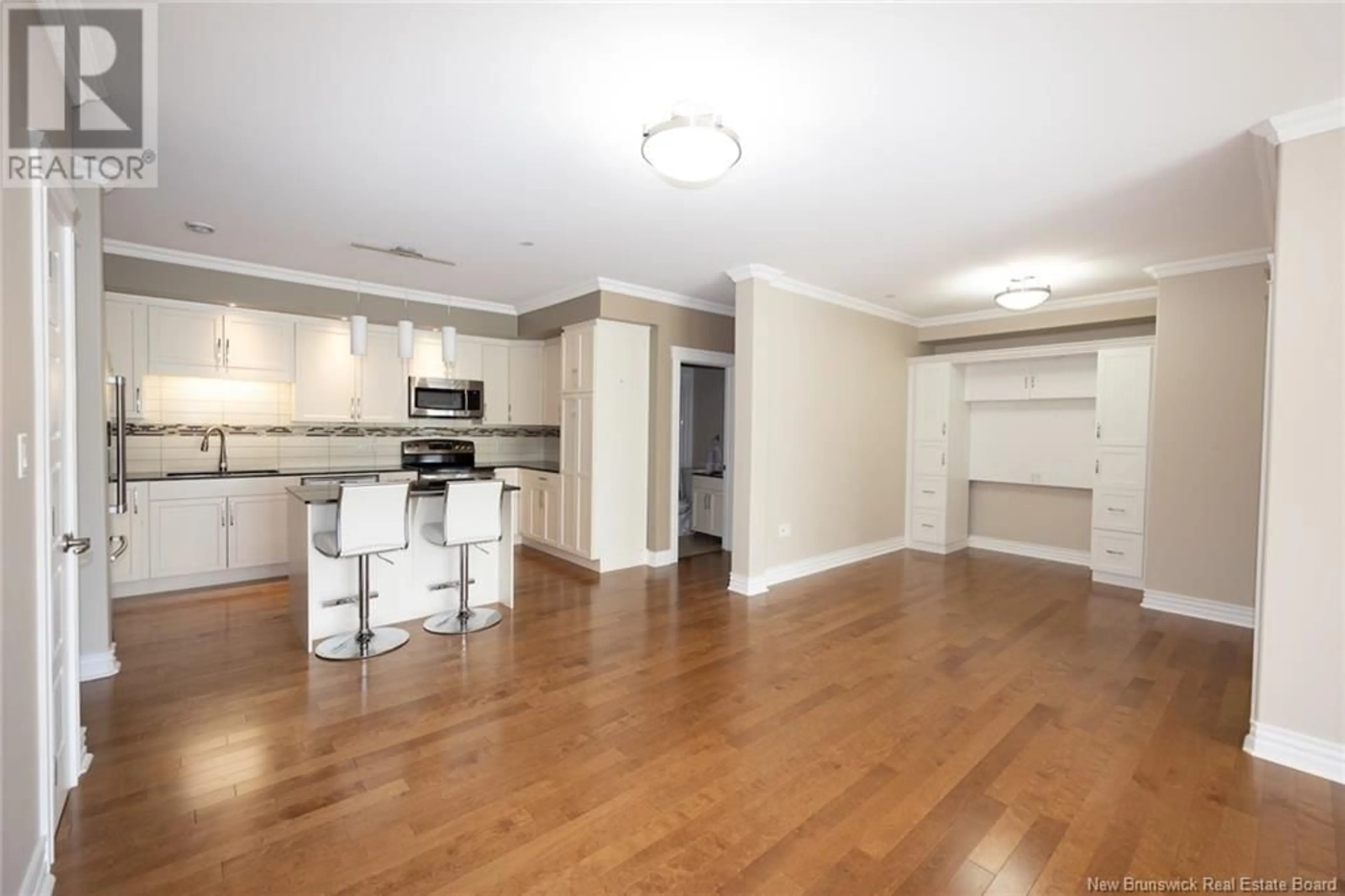 Open concept kitchen, wood/laminate floor for 106 - 700 UNION STREET, Devon New Brunswick E3A3N7