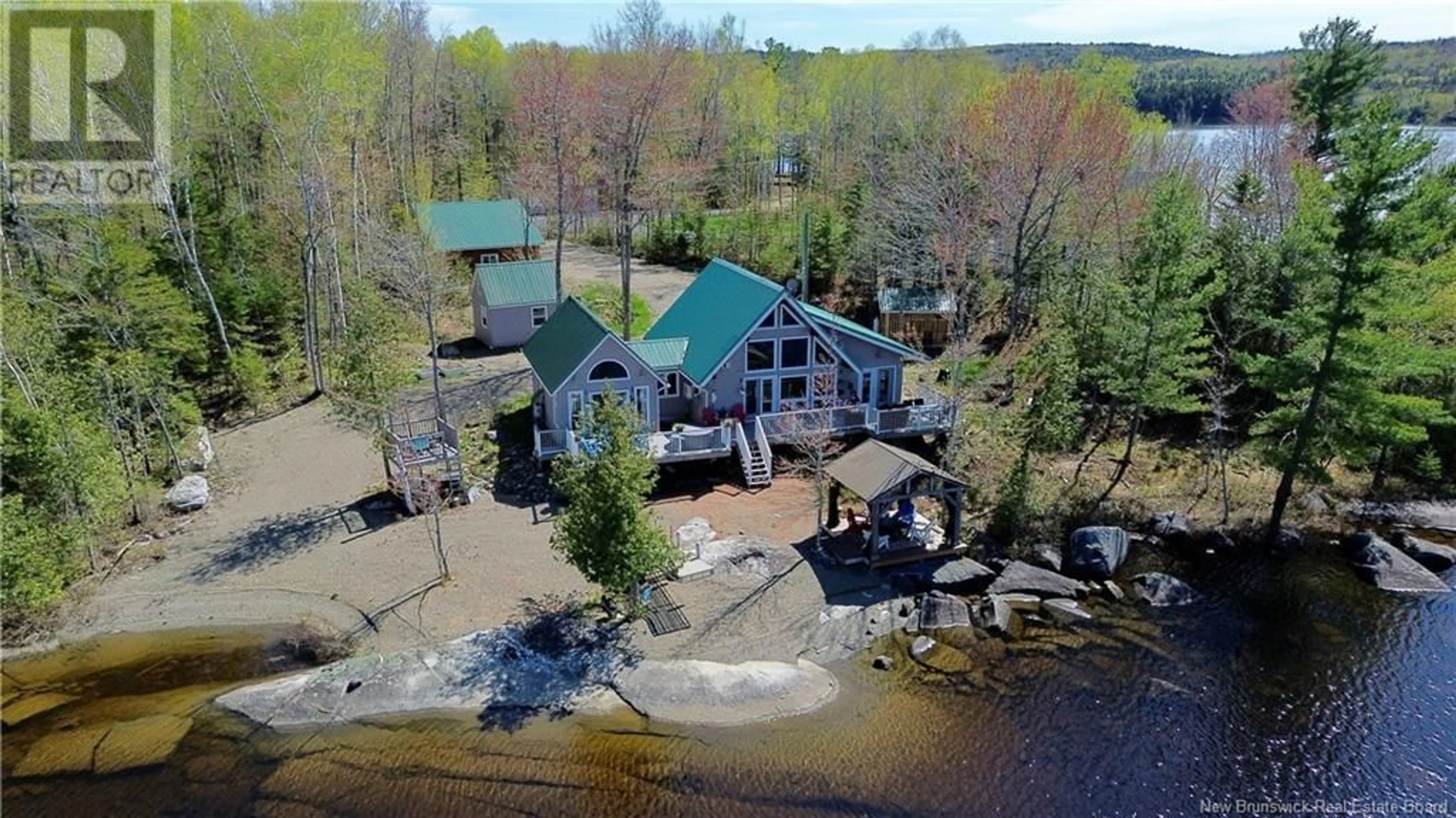 A pic from outside/outdoor area/front of a property/back of a property/a pic from drone, water/lake/river/ocean view for 10 FAULKNER LANE, Second Eel Lake New Brunswick E6H0B4