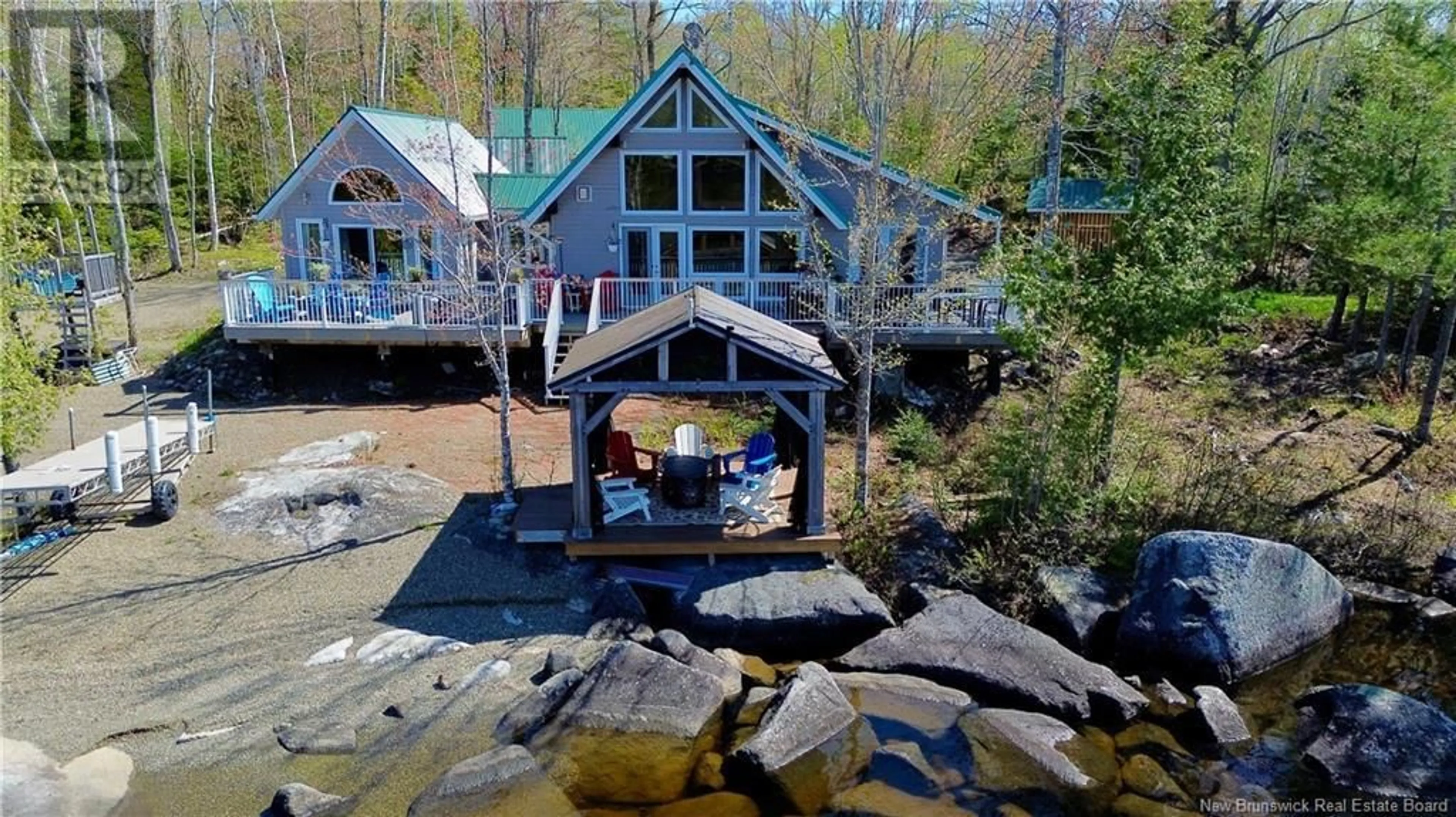 A pic from outside/outdoor area/front of a property/back of a property/a pic from drone, water/lake/river/ocean view for 10 FAULKNER LANE, Second Eel Lake New Brunswick E6H0B4