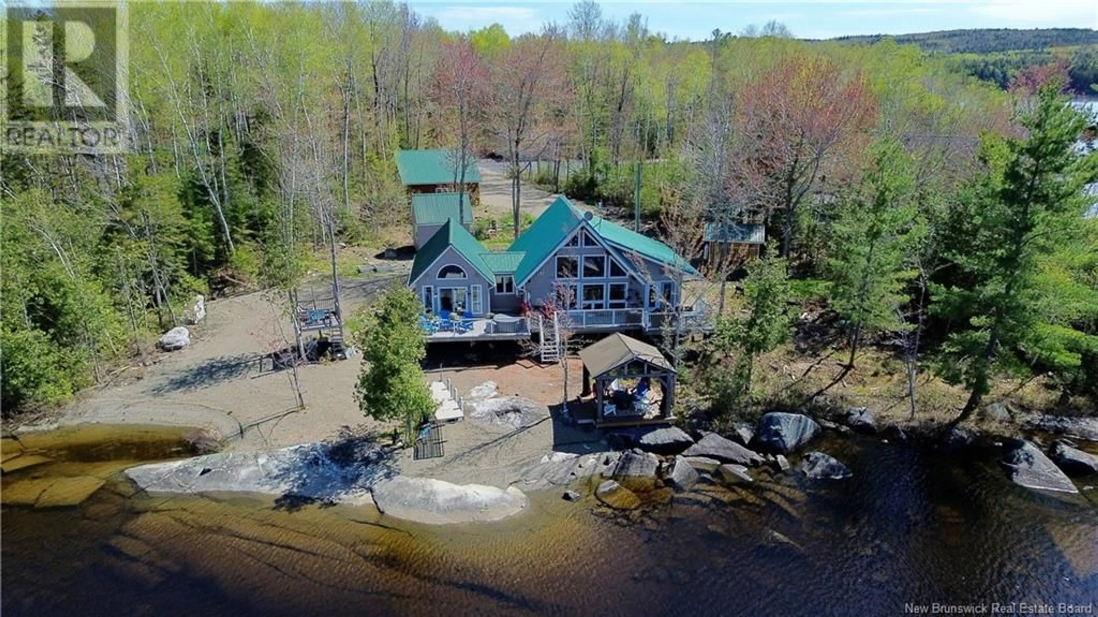 A pic from outside/outdoor area/front of a property/back of a property/a pic from drone, water/lake/river/ocean view for 10 FAULKNER LANE, Second Eel Lake New Brunswick E6H0B4
