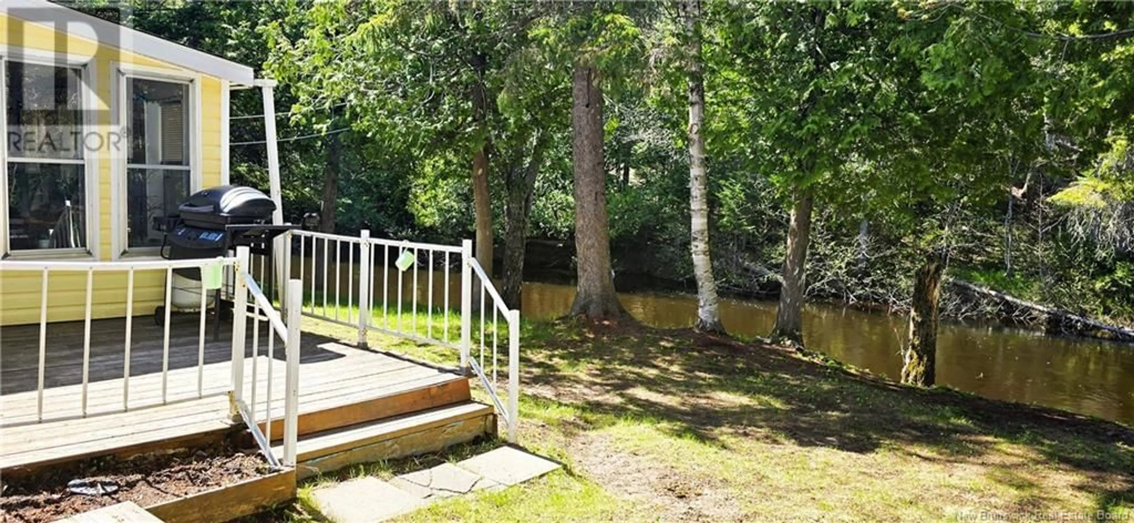 Patio, forest/trees view for 88 ALLÉE DES SAISONNIERS LANE, Bertrand New Brunswick E1W1M3