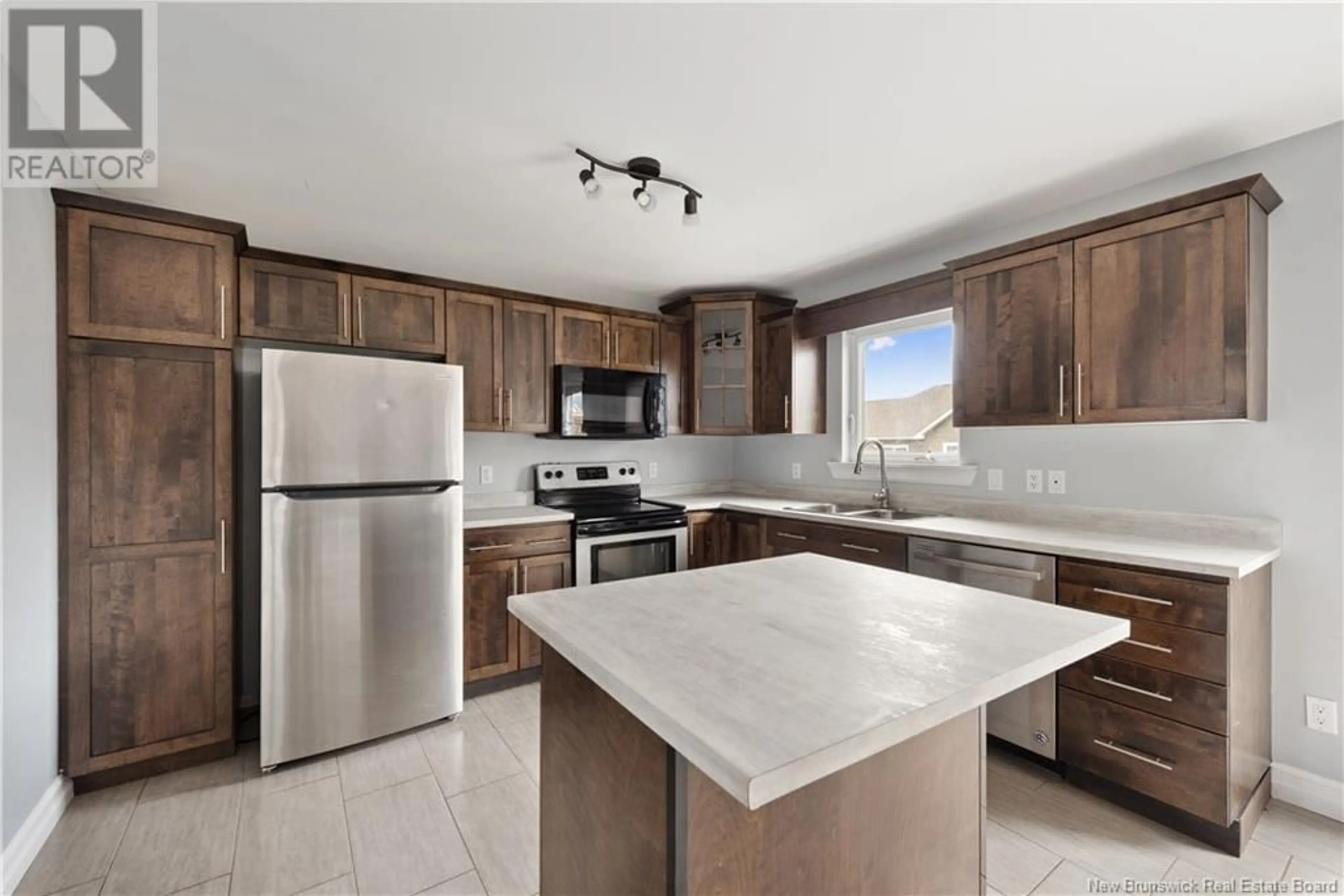 Open concept kitchen, ceramic/tile floor for 60 RUBY WAY, Moncton New Brunswick E1E0H4