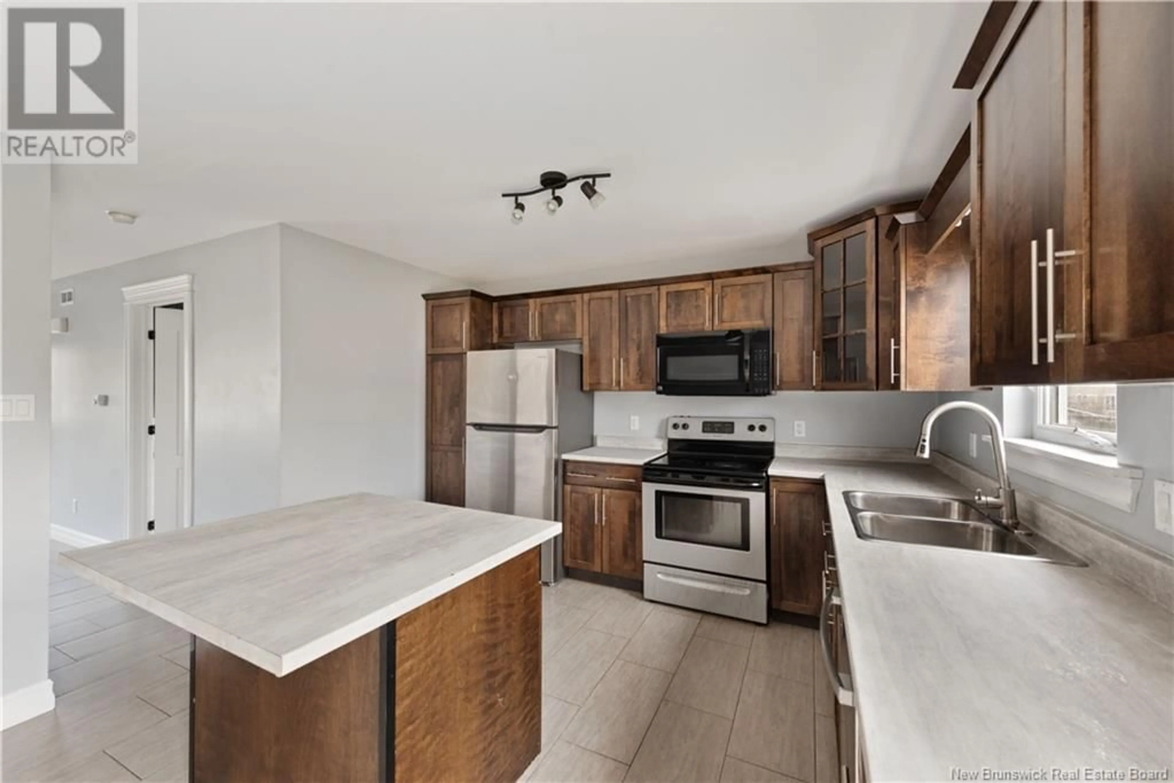 Open concept kitchen, ceramic/tile floor for 60 RUBY WAY, Moncton New Brunswick E1E0H4