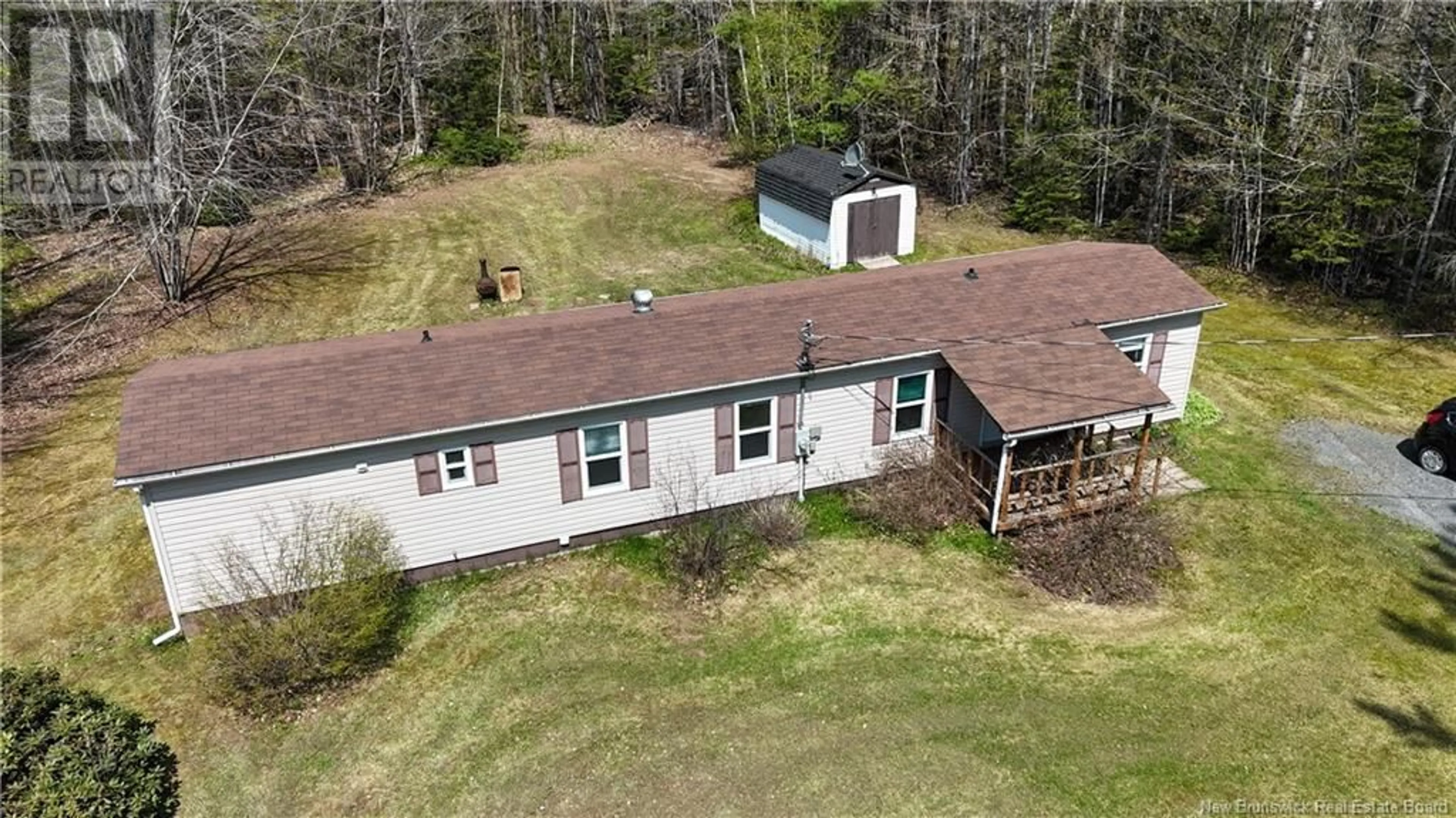 A pic from outside/outdoor area/front of a property/back of a property/a pic from drone, unknown for 20 COLBURNE DRIVE, Geary New Brunswick E2V4A6