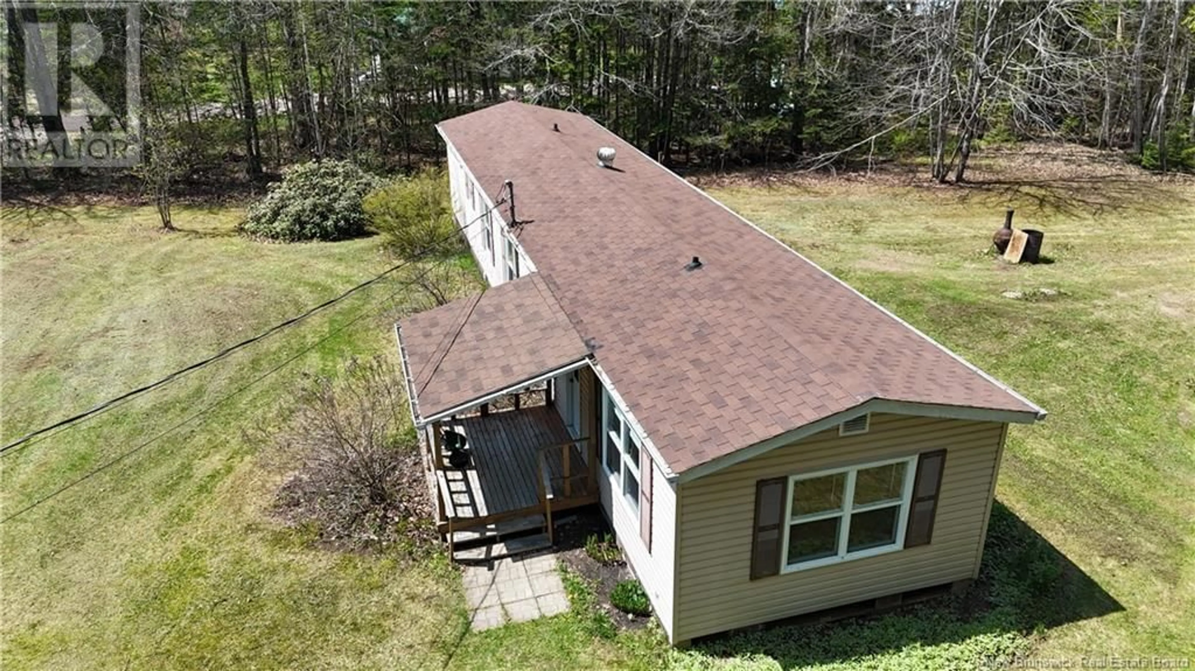 A pic from outside/outdoor area/front of a property/back of a property/a pic from drone, building for 20 COLBURNE DRIVE, Geary New Brunswick E2V4A6
