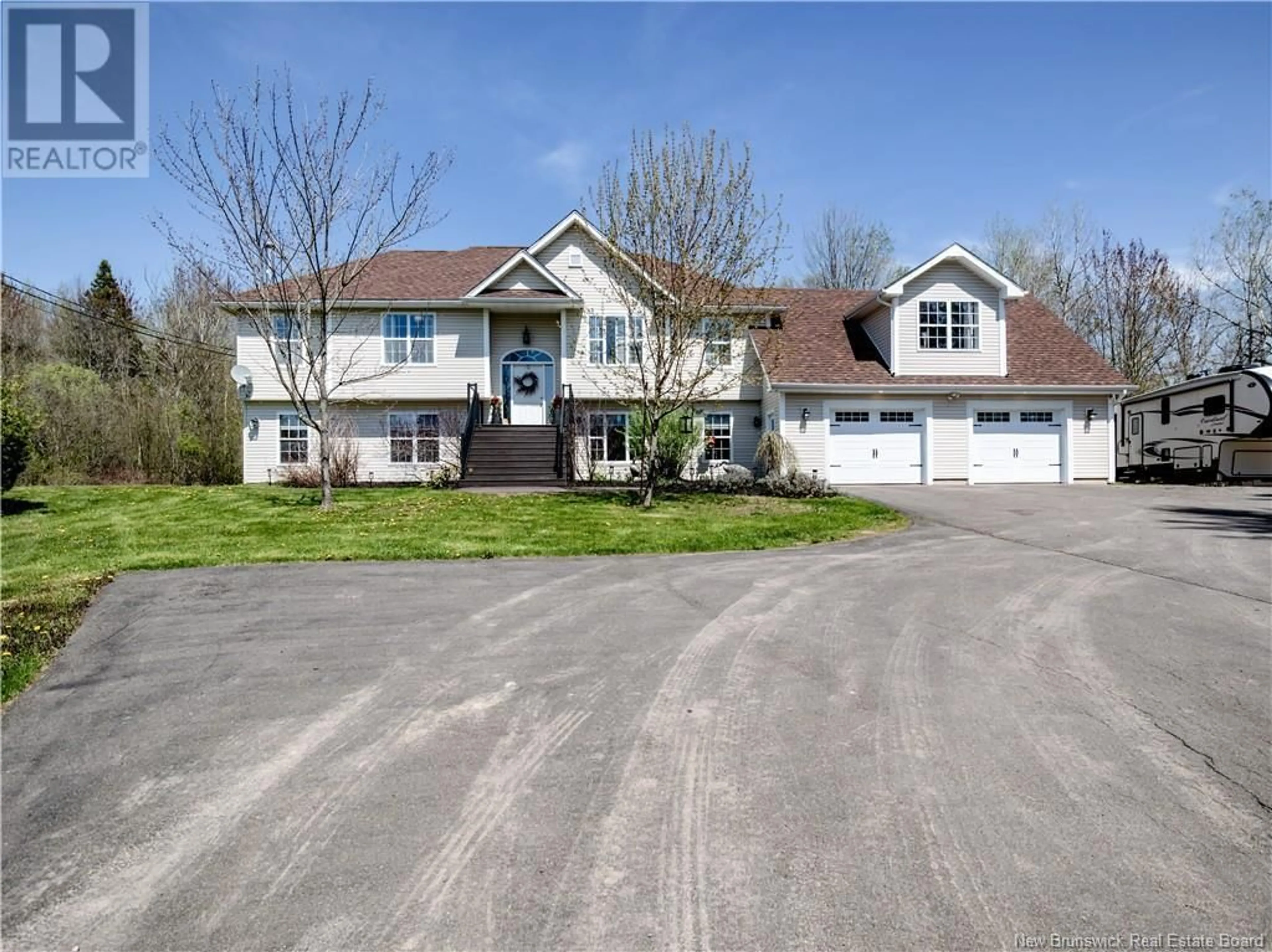A pic from outside/outdoor area/front of a property/back of a property/a pic from drone, street for 21 ROGERS, Berry Mills New Brunswick E1G2N2