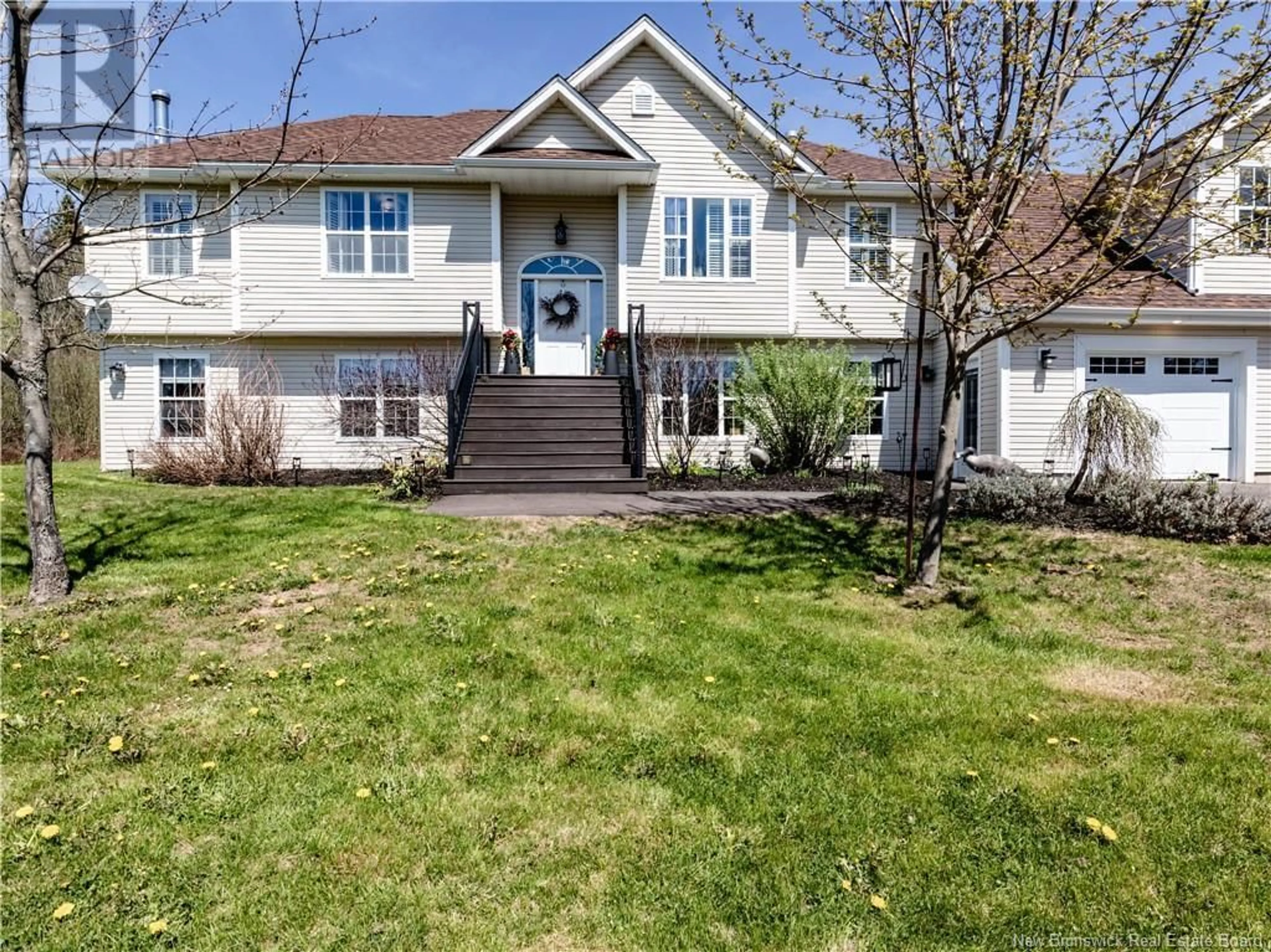 Home with vinyl exterior material, street for 21 ROGERS, Berry Mills New Brunswick E1G2N2