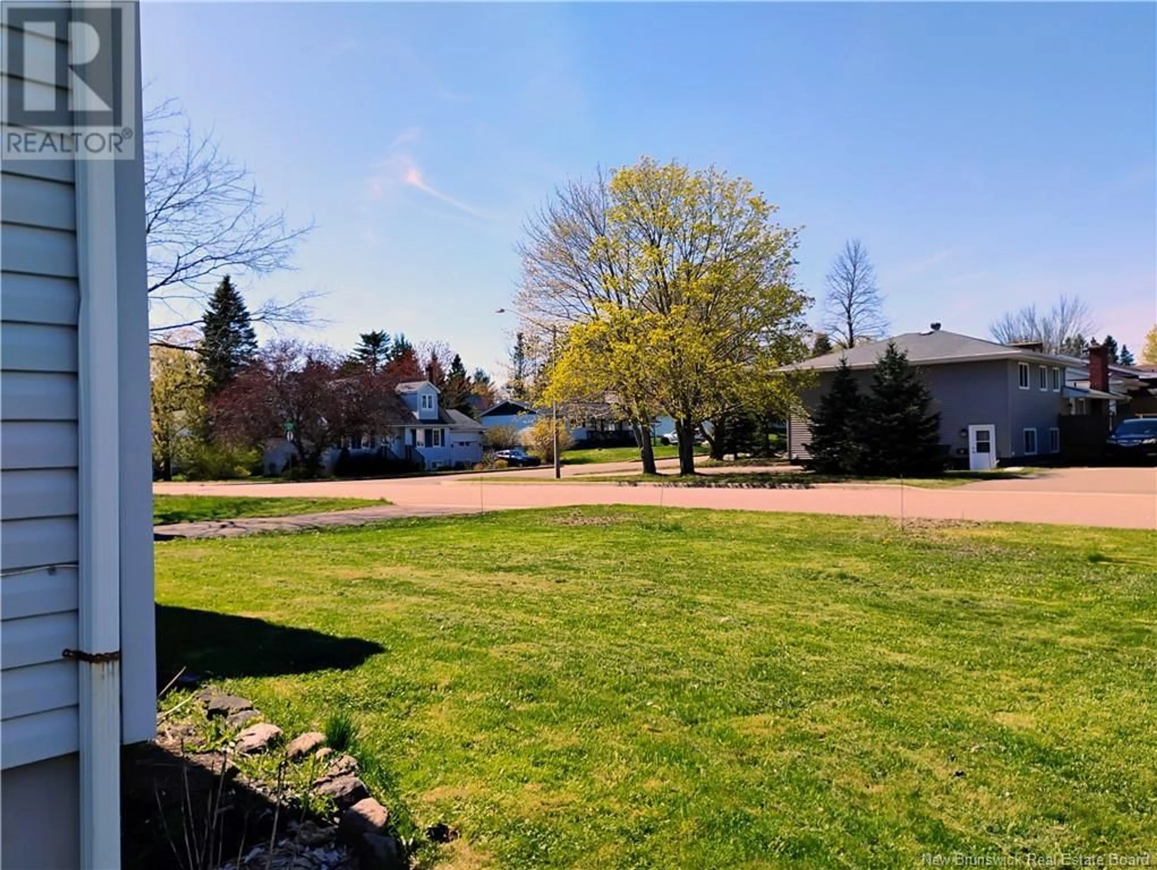 A pic from outside/outdoor area/front of a property/back of a property/a pic from drone, unknown for 254 CHANTAL, Dieppe New Brunswick E1A4X9