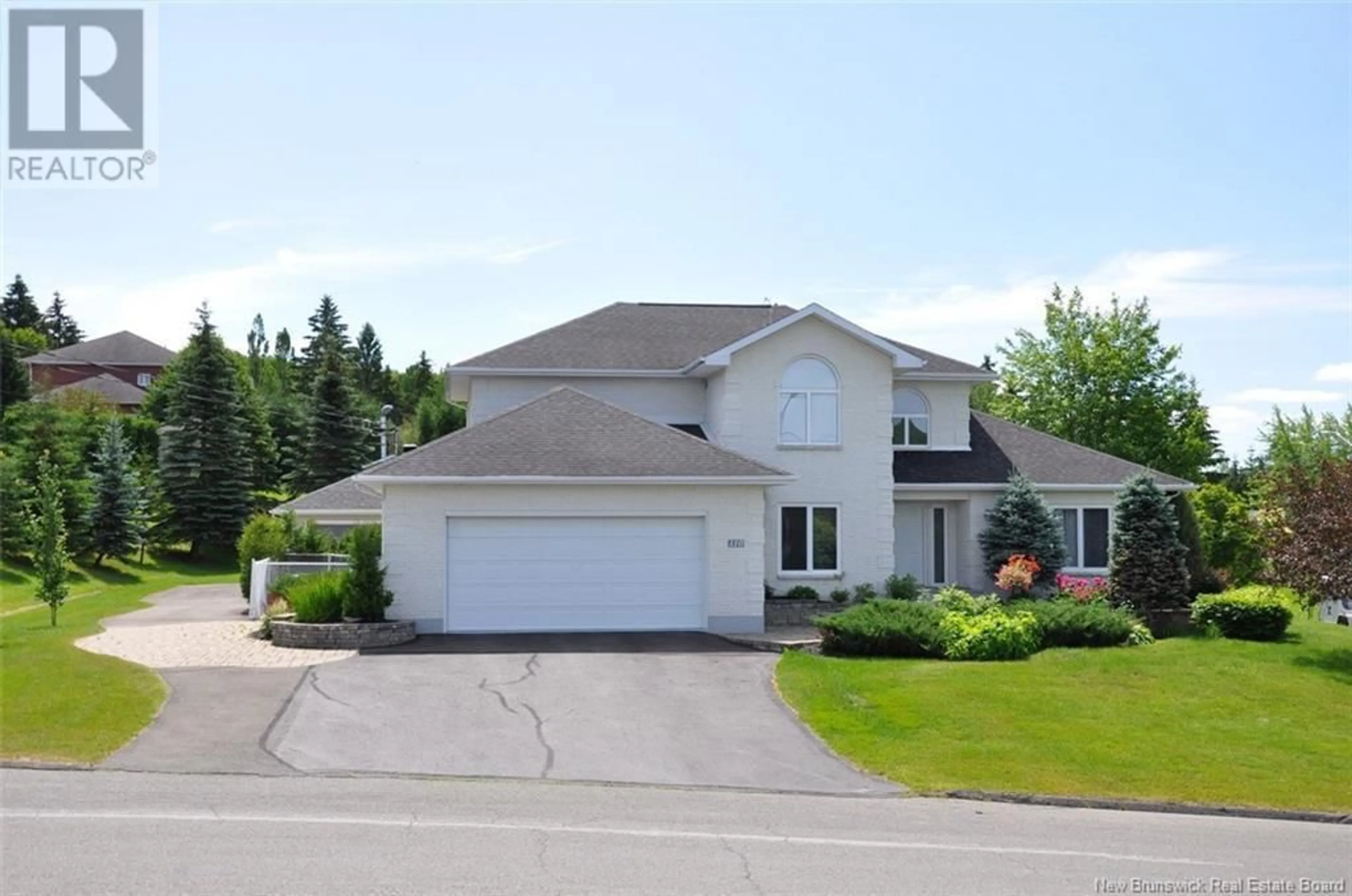 A pic from outside/outdoor area/front of a property/back of a property/a pic from drone, street for 110 BOSSÉ AVENUE, Edmundston New Brunswick E3V4A2