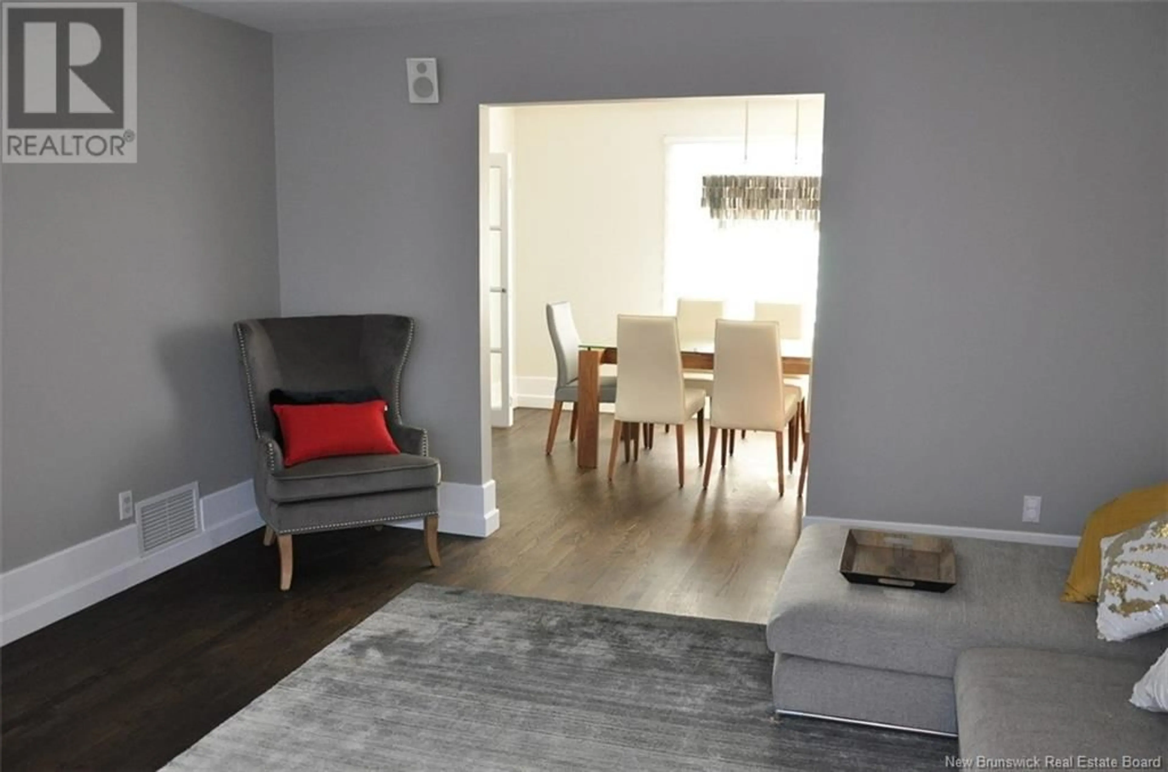Living room with furniture, wood/laminate floor for 110 BOSSÉ AVENUE, Edmundston New Brunswick E3V4A2