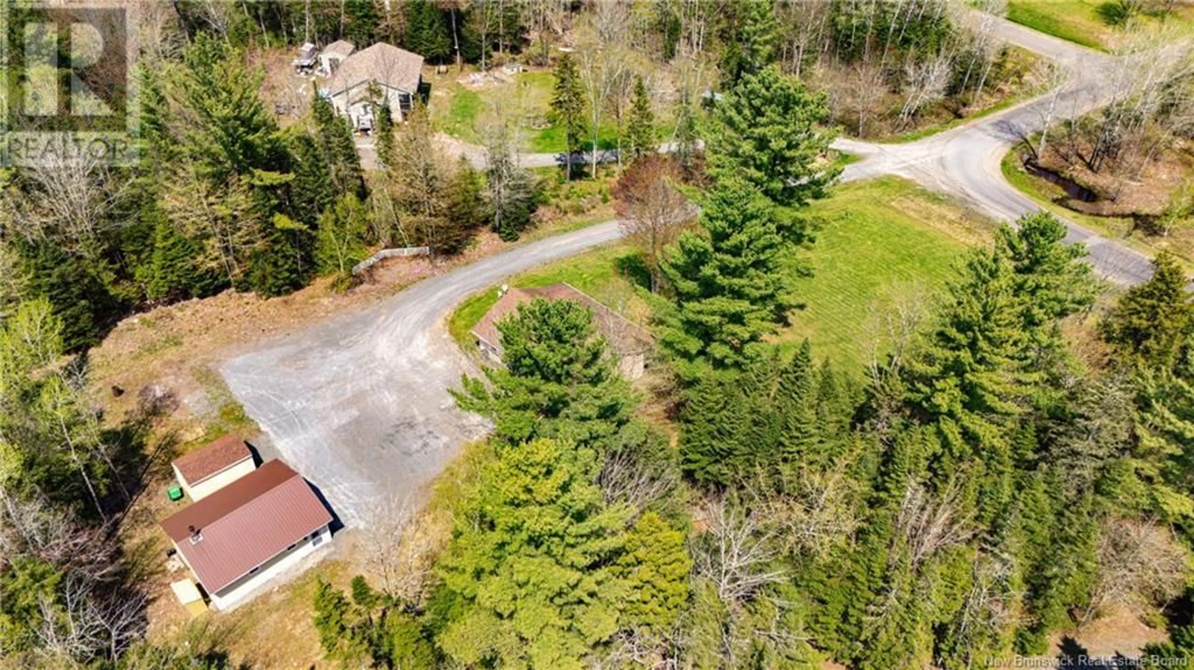 A pic from outside/outdoor area/front of a property/back of a property/a pic from drone, forest/trees view for 10 RALPH STREET, Noonan New Brunswick E3A0K9