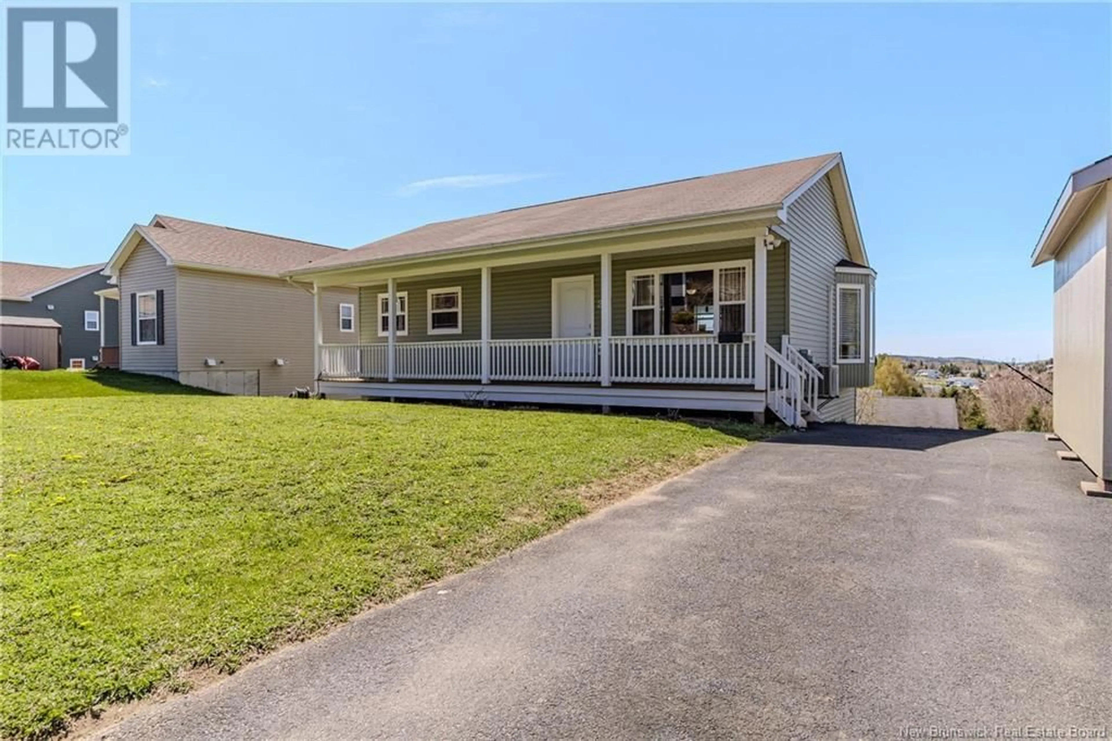 Home with vinyl exterior material, street for 25 REBA ROAD, Saint John New Brunswick E2J0E4