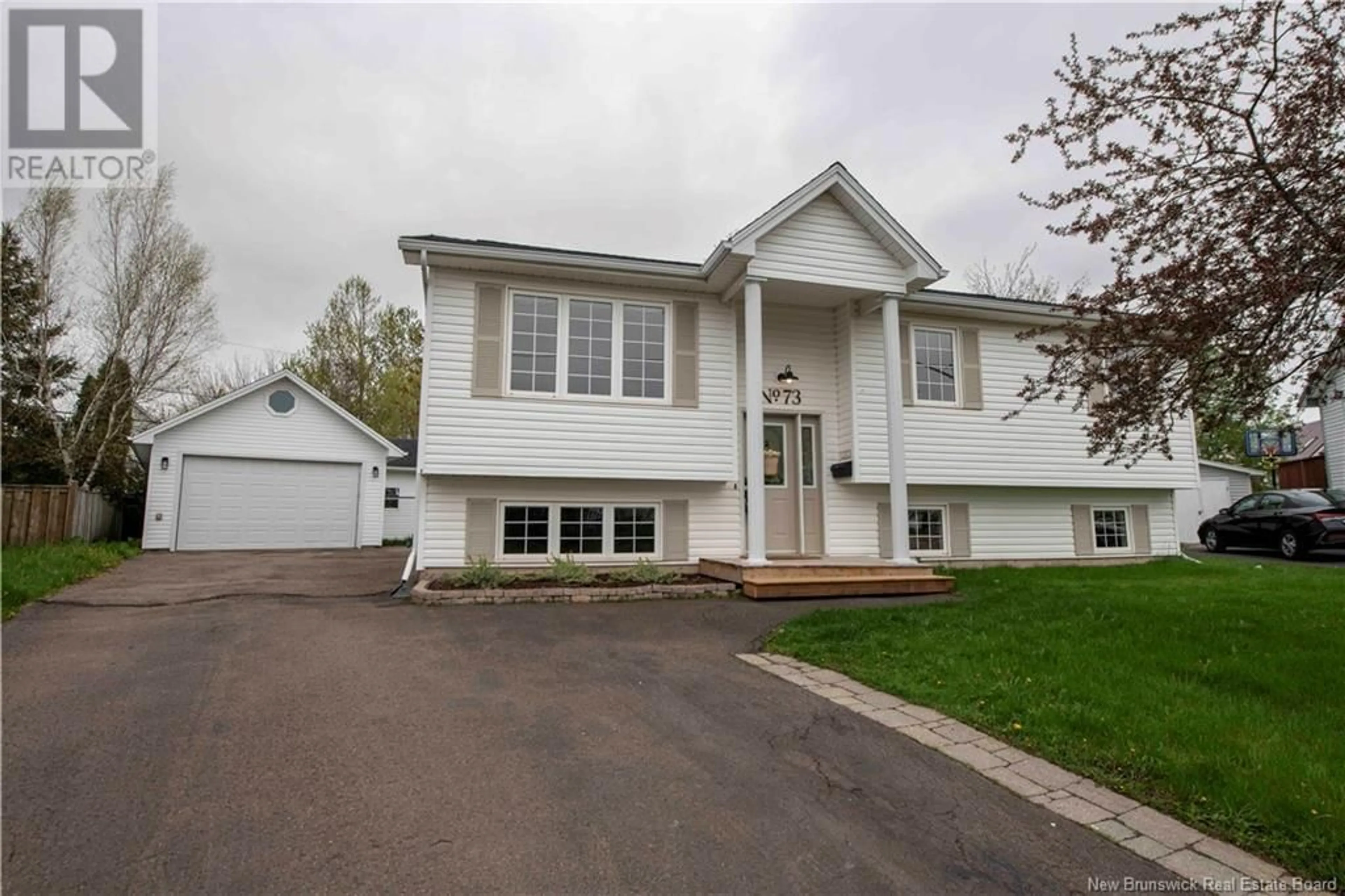 Home with vinyl exterior material, street for 73 HARDWOOD CRESCENT, Moncton New Brunswick E1G4T6
