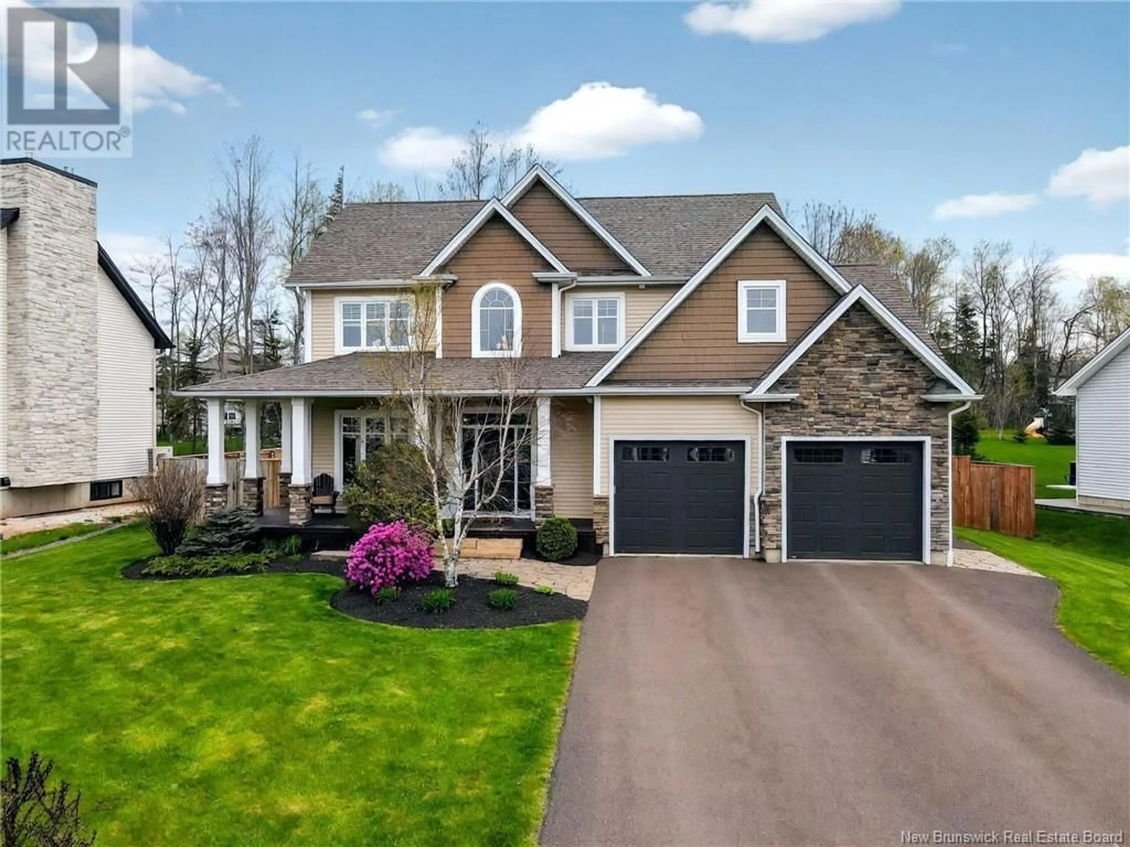 Home with vinyl exterior material, street for 28 CHAMPION STREET, Dieppe New Brunswick E1A9E8