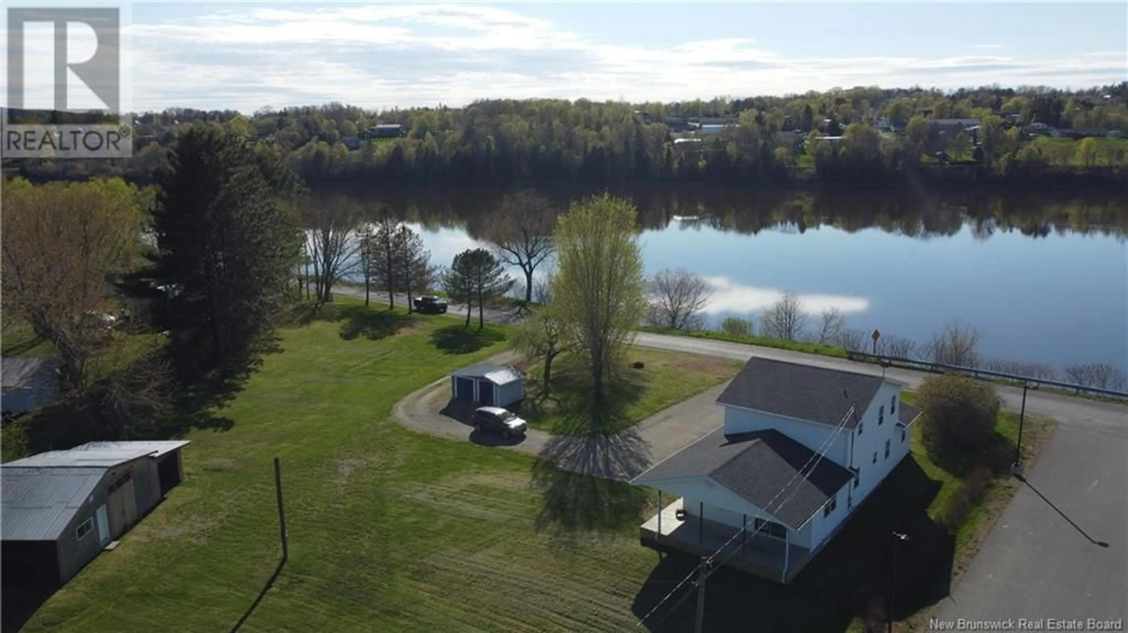 A pic from outside/outdoor area/front of a property/back of a property/a pic from drone, water/lake/river/ocean view for 7 GRAFTON SHORE ROAD, Grafton New Brunswick E7N1A1