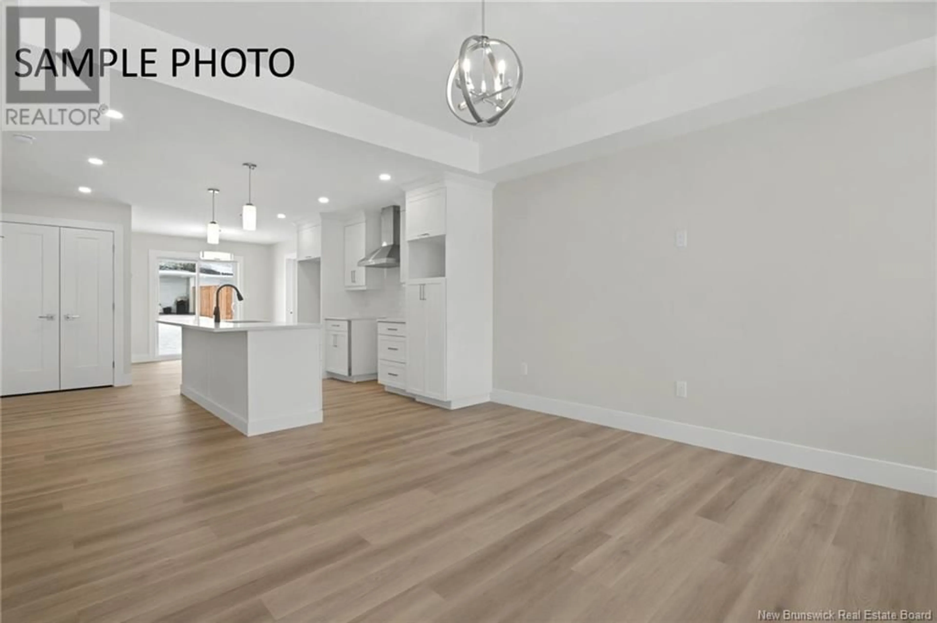 Open concept kitchen, wood/laminate floor for 3 RUBY STREET, Grand-Barachois New Brunswick E4P9H4