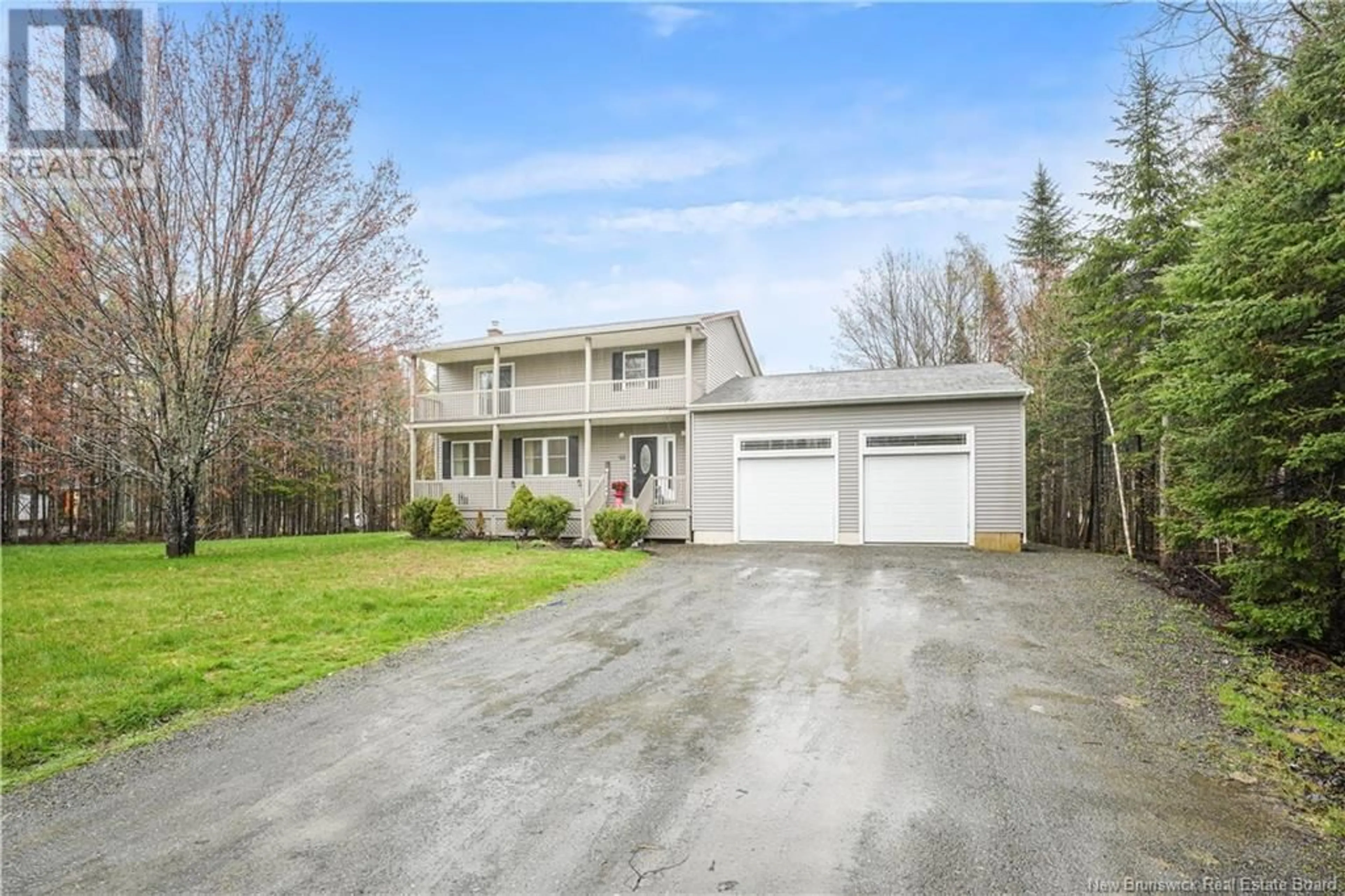 A pic from outside/outdoor area/front of a property/back of a property/a pic from drone, street for 122 BURNETT DRIVE, Hanwell New Brunswick E3C2J4