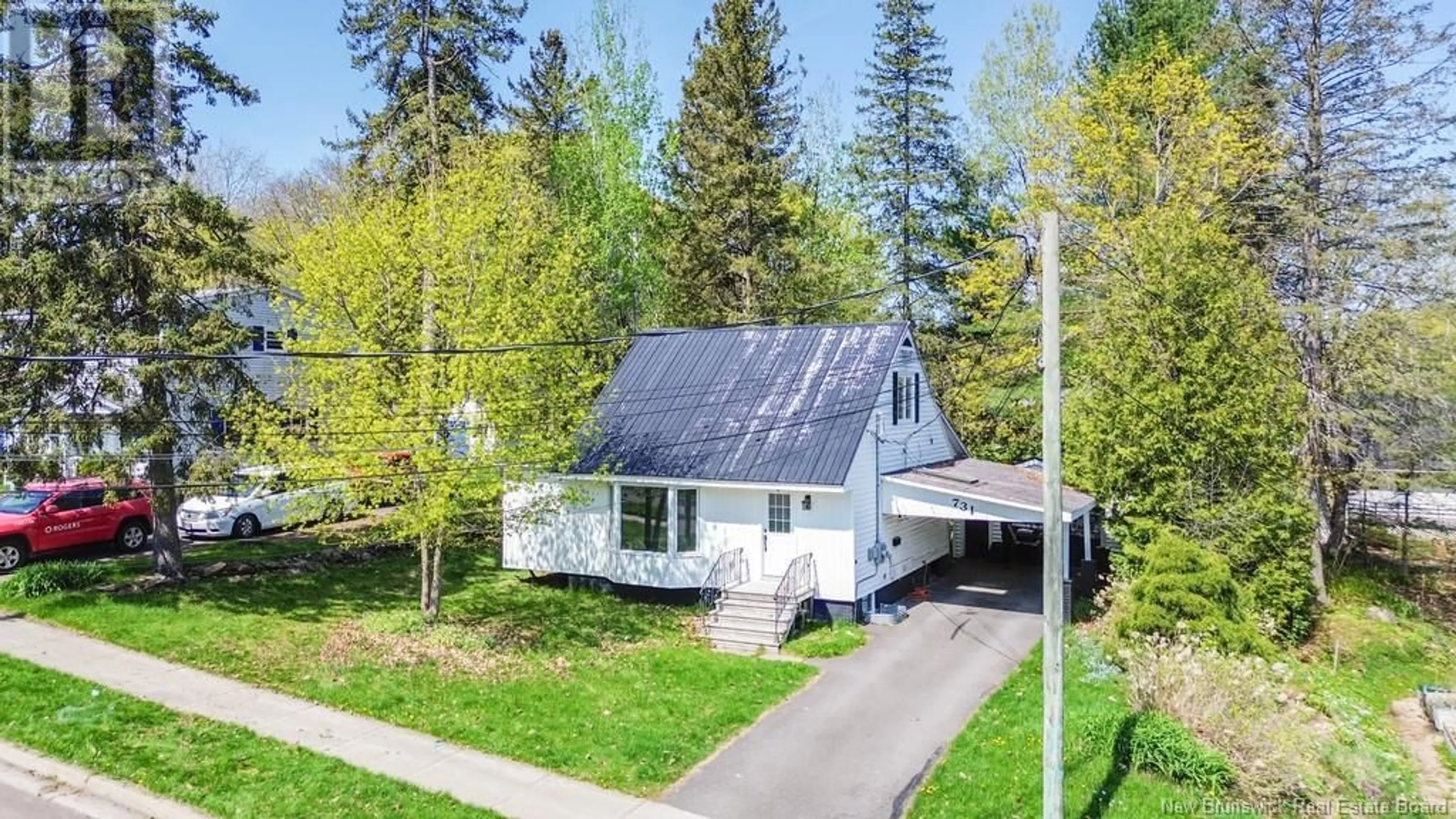 A pic from outside/outdoor area/front of a property/back of a property/a pic from drone, street for 731 REID STREET, Fredericton New Brunswick E3B3V6