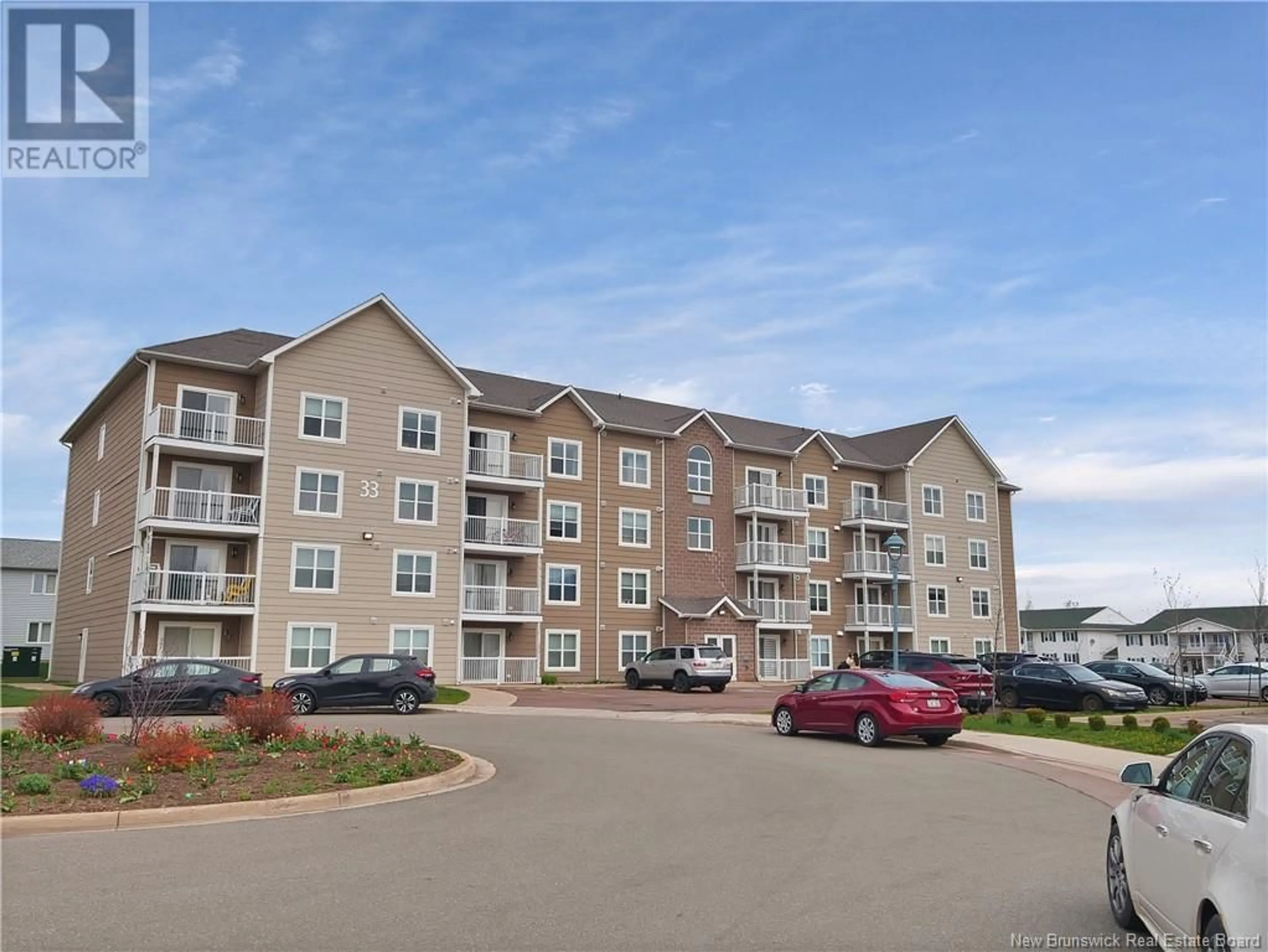 A pic from outside/outdoor area/front of a property/back of a property/a pic from drone, water/lake/river/ocean view for 305 - 33 SIFROI STREET, Dieppe New Brunswick E1A1L6