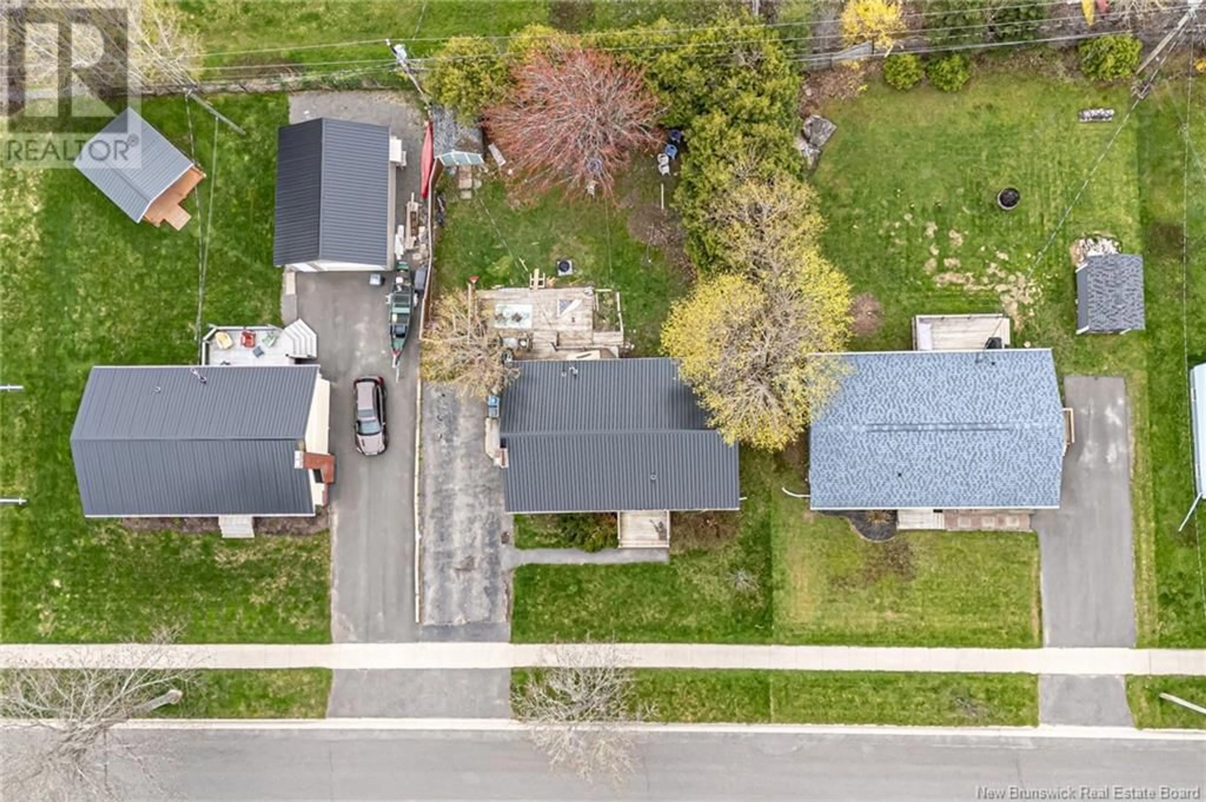 A pic from outside/outdoor area/front of a property/back of a property/a pic from drone, street for 62 SOUTHAMPTON DRIVE, Fredericton New Brunswick E3B4T3