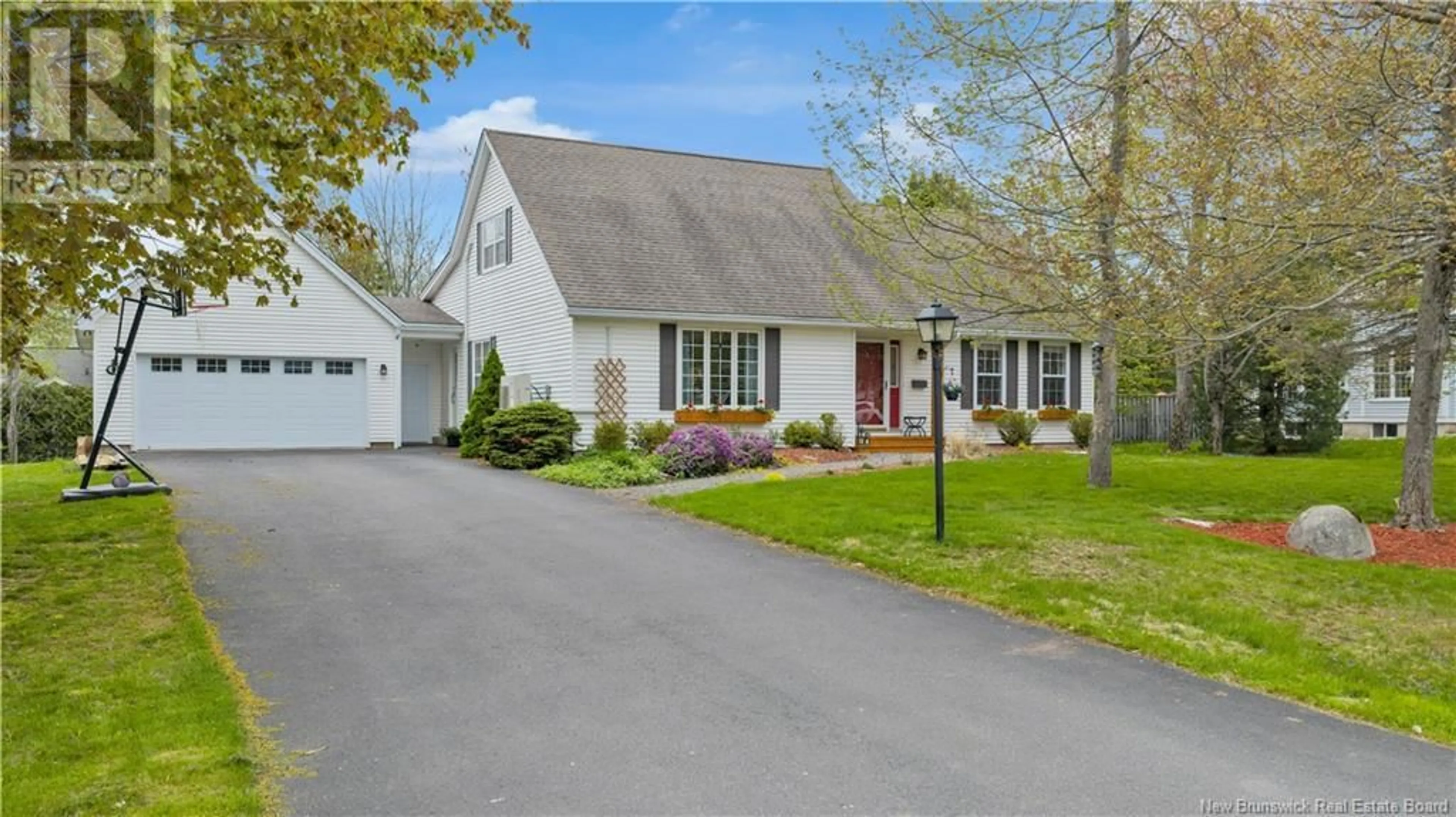 Home with vinyl exterior material, street for 7 VALLEY ROAD, Rothesay New Brunswick E2H2X6
