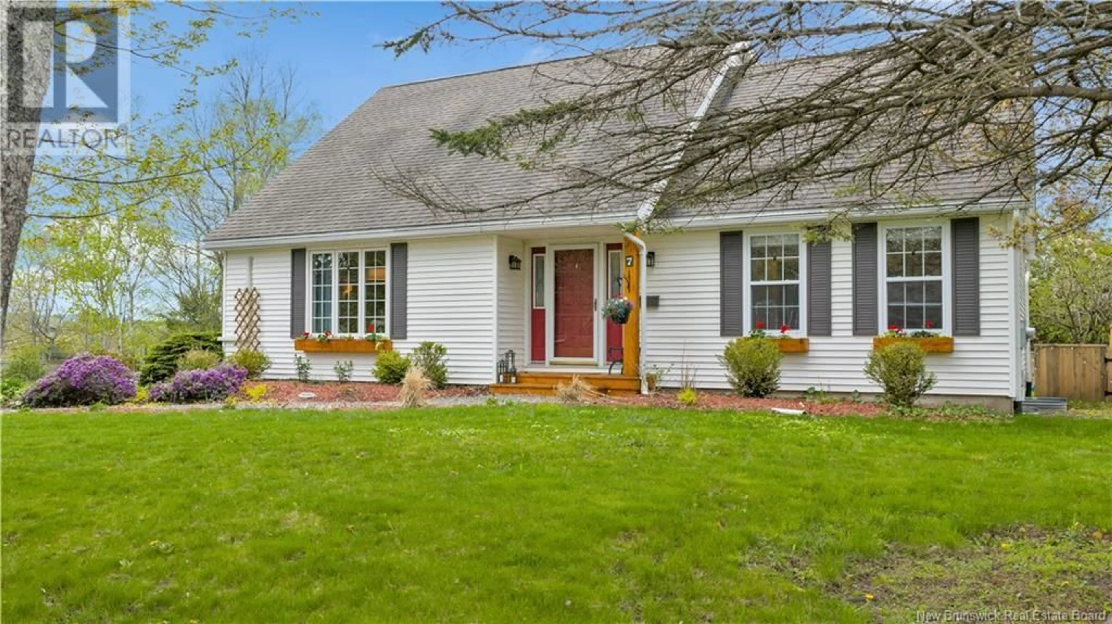 Home with vinyl exterior material, street for 7 VALLEY ROAD, Rothesay New Brunswick E2H2X6