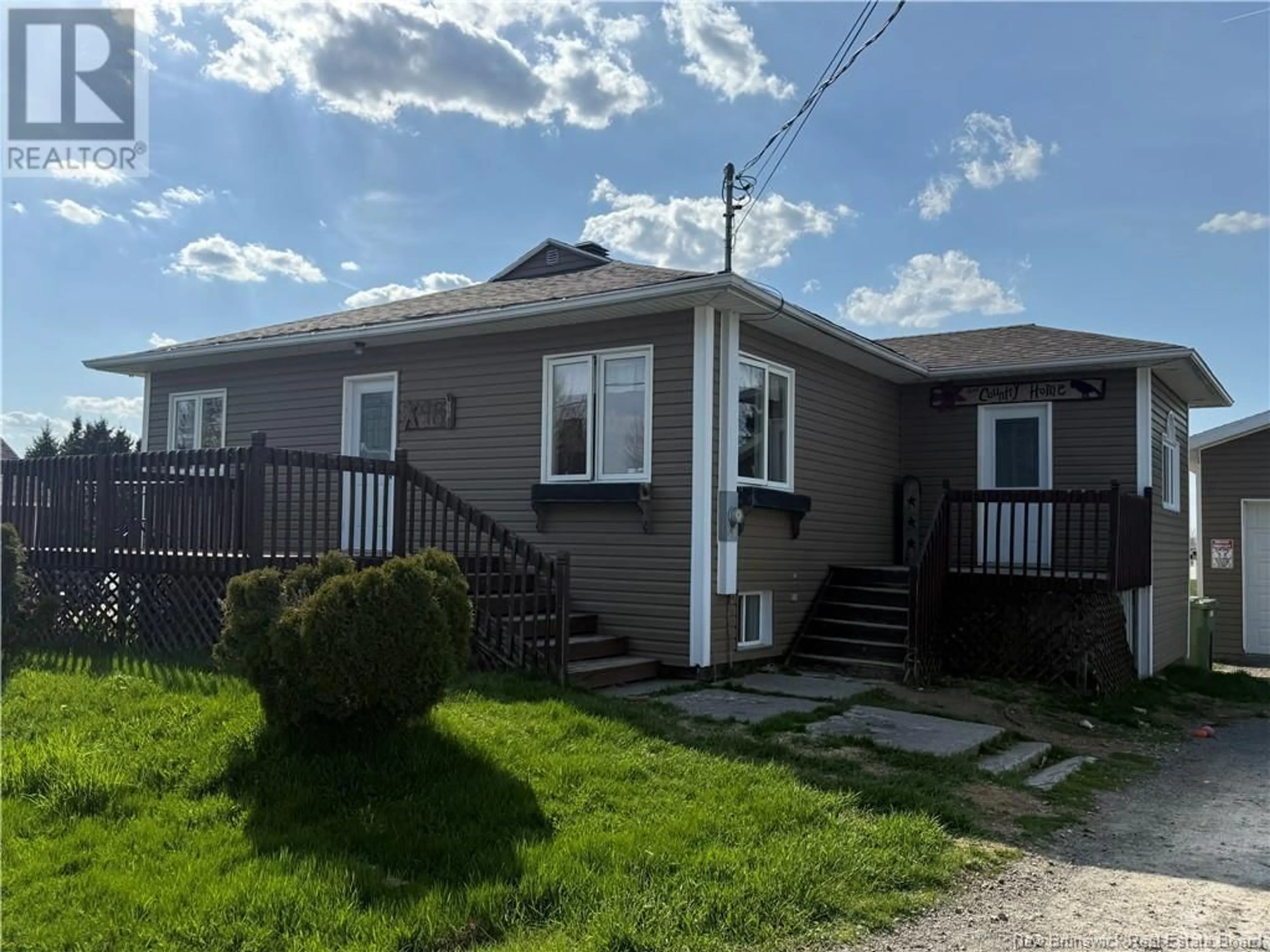 Home with vinyl exterior material, street for 98 ST ANTOINE STREET, Saint-Léonard New Brunswick E7E1Z4