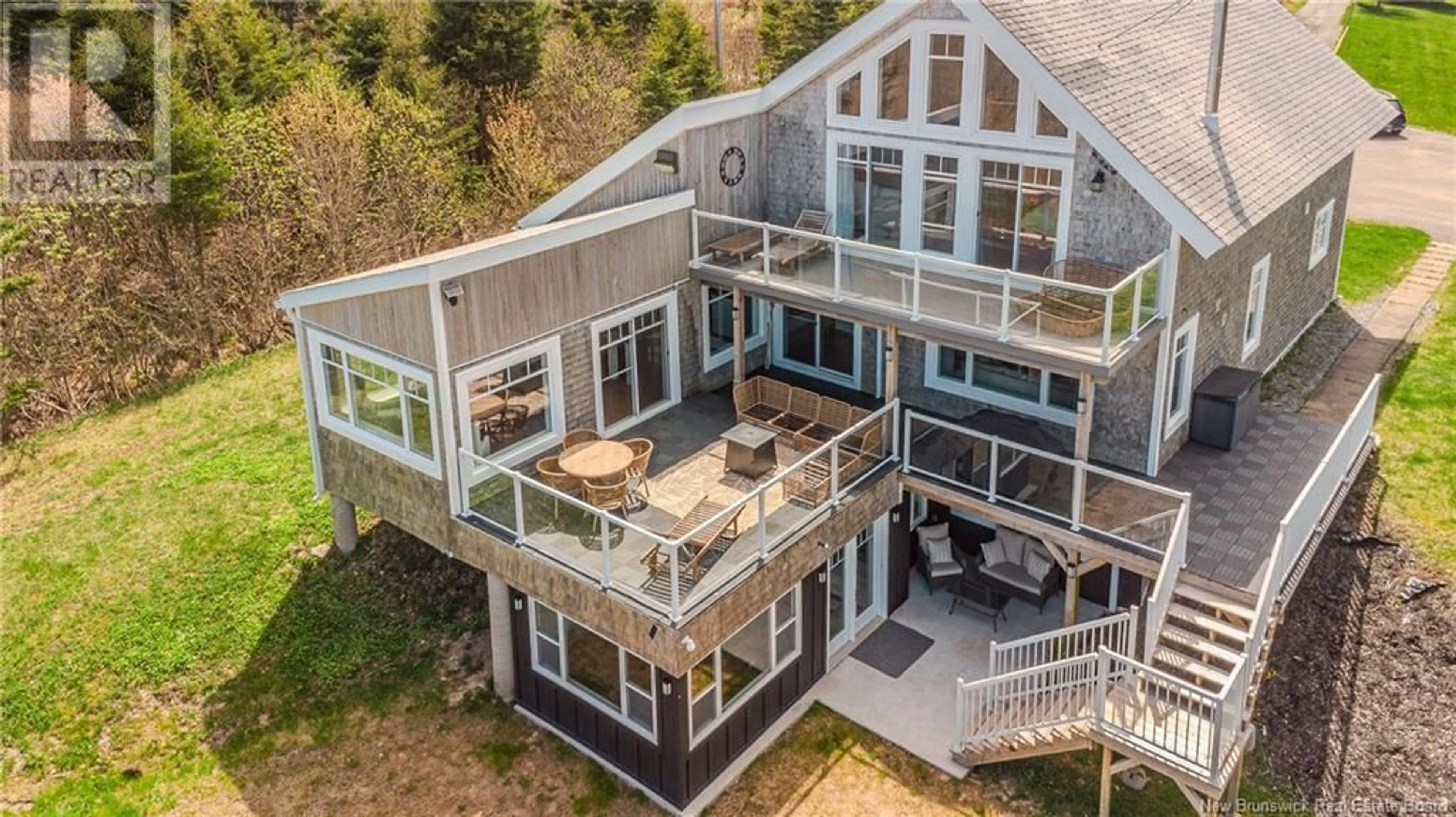 A pic from outside/outdoor area/front of a property/back of a property/a pic from drone, water/lake/river/ocean view for 396 POINT ROAD, Saint John New Brunswick E2M7J9