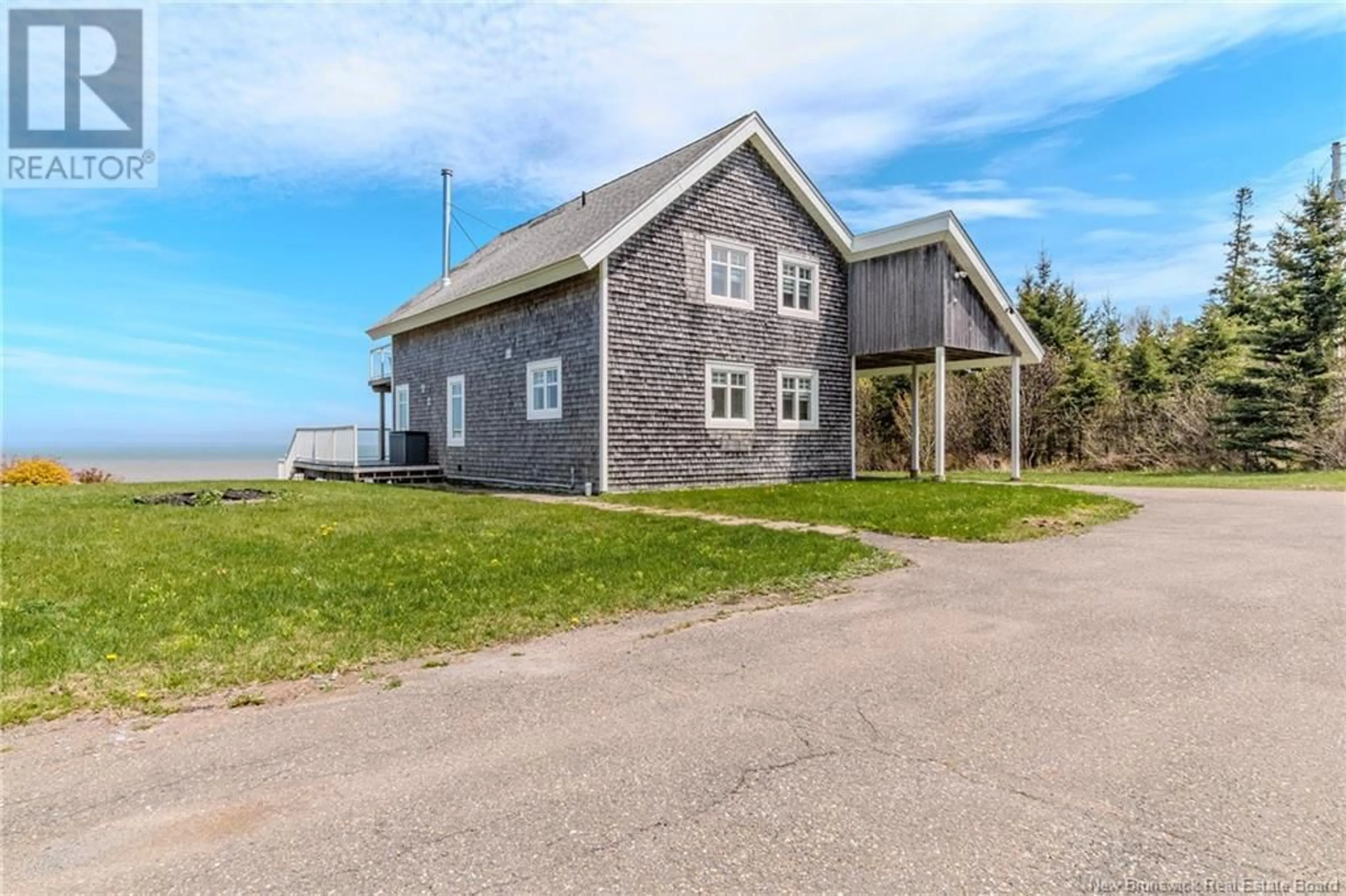 A pic from outside/outdoor area/front of a property/back of a property/a pic from drone, building for 396 POINT ROAD, Saint John New Brunswick E2M7J9