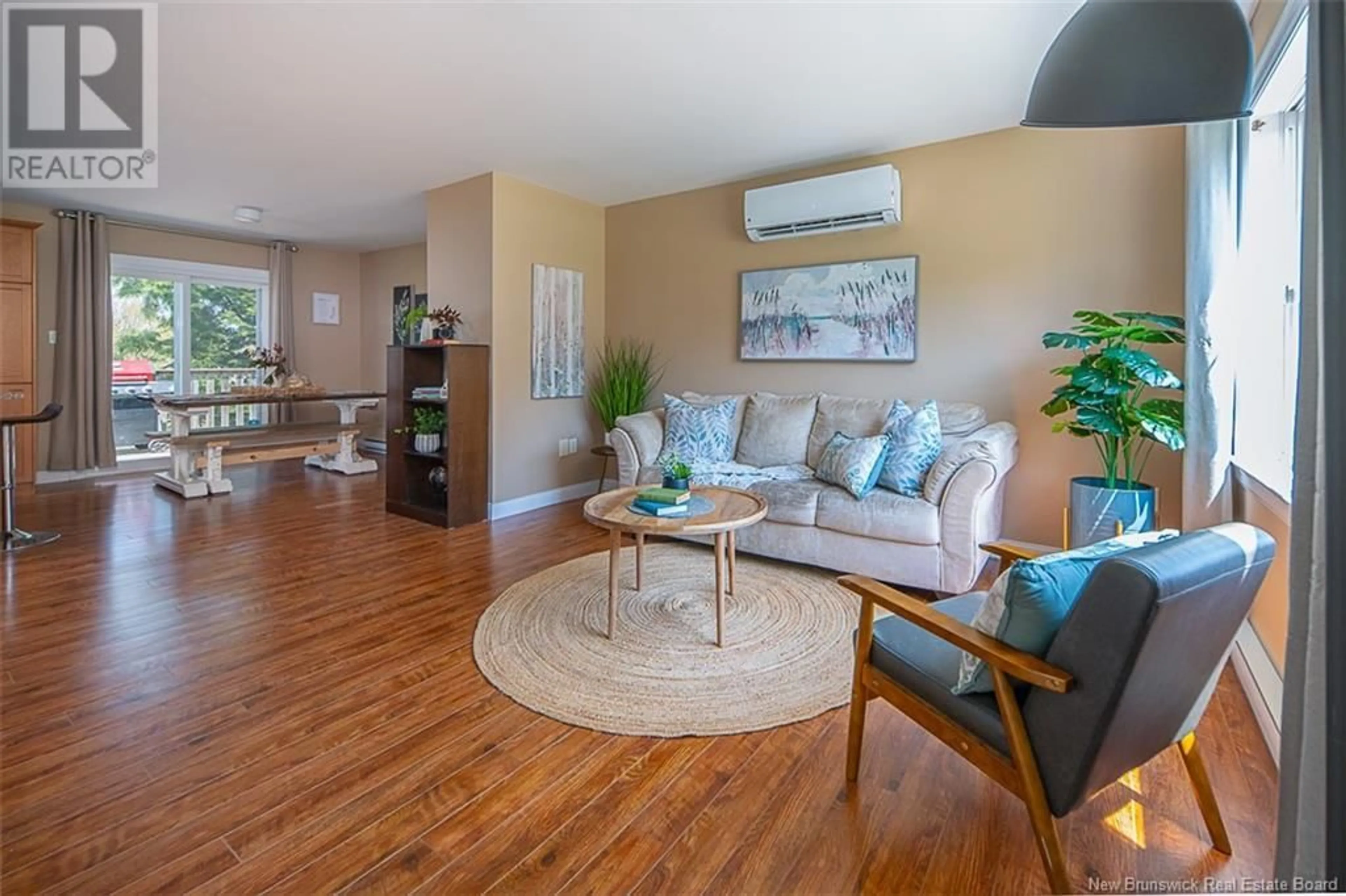 Living room with furniture, wood/laminate floor for 10 SILENT HILLS DRIVE, Fredericton New Brunswick E3C0J8