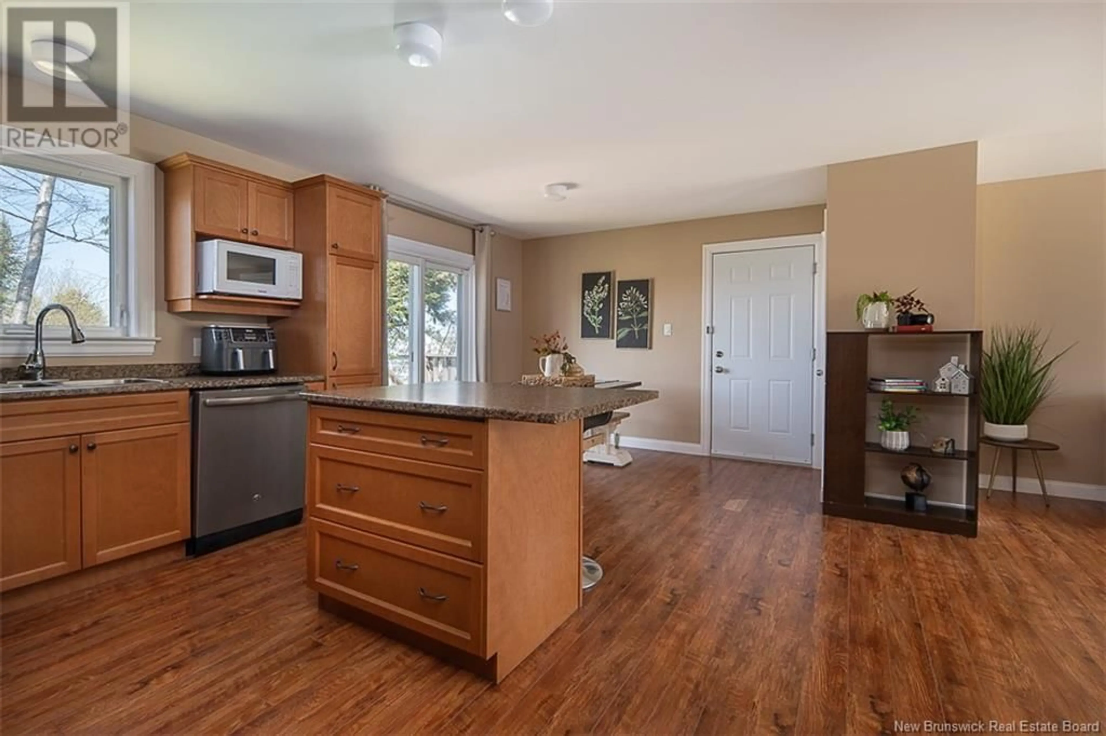 Open concept kitchen, wood/laminate floor for 10 SILENT HILLS DRIVE, Fredericton New Brunswick E3C0J8