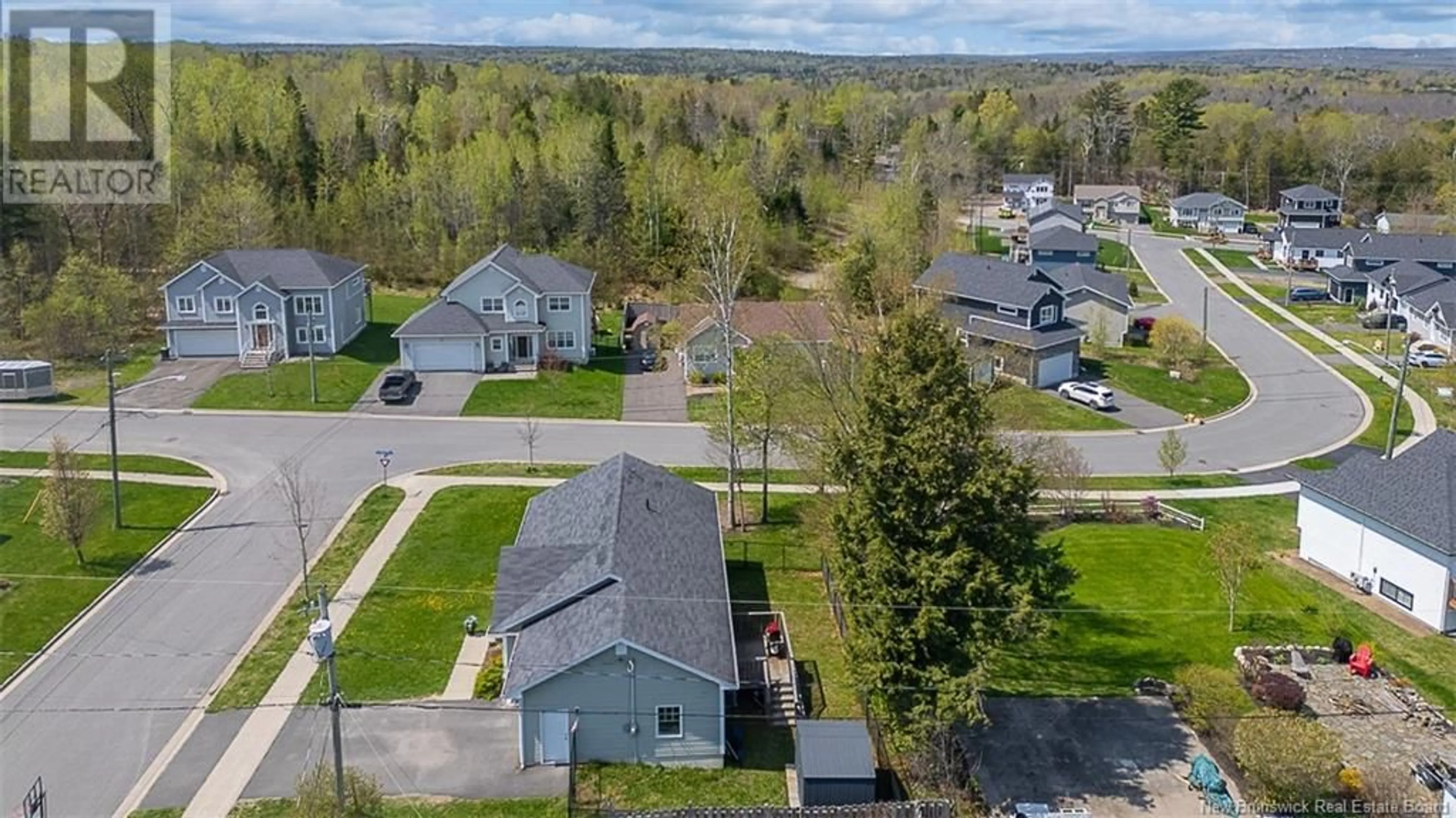 A pic from outside/outdoor area/front of a property/back of a property/a pic from drone, street for 10 SILENT HILLS DRIVE, Fredericton New Brunswick E3C0J8