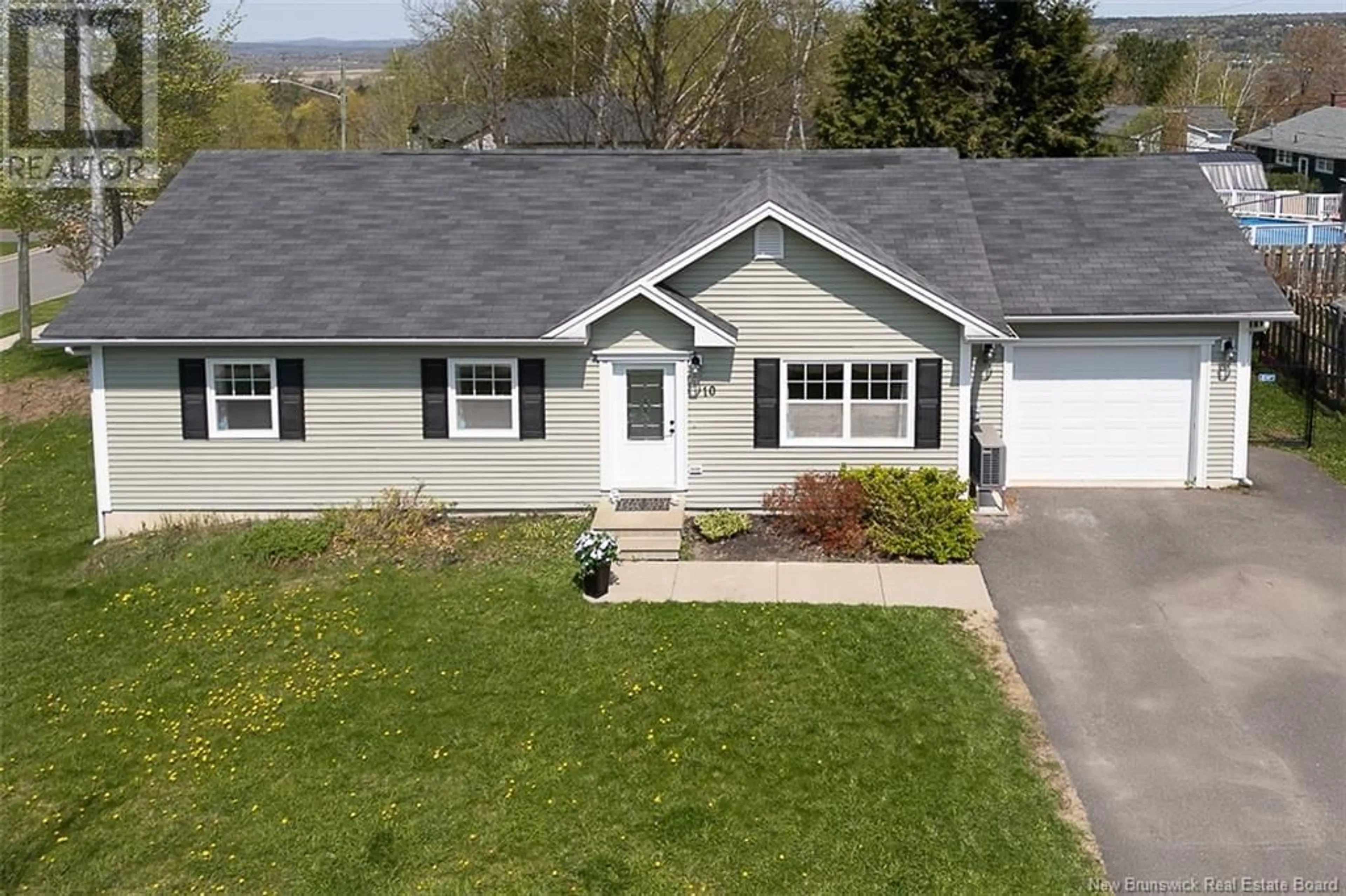 Home with vinyl exterior material, street for 10 SILENT HILLS DRIVE, Fredericton New Brunswick E3C0J8