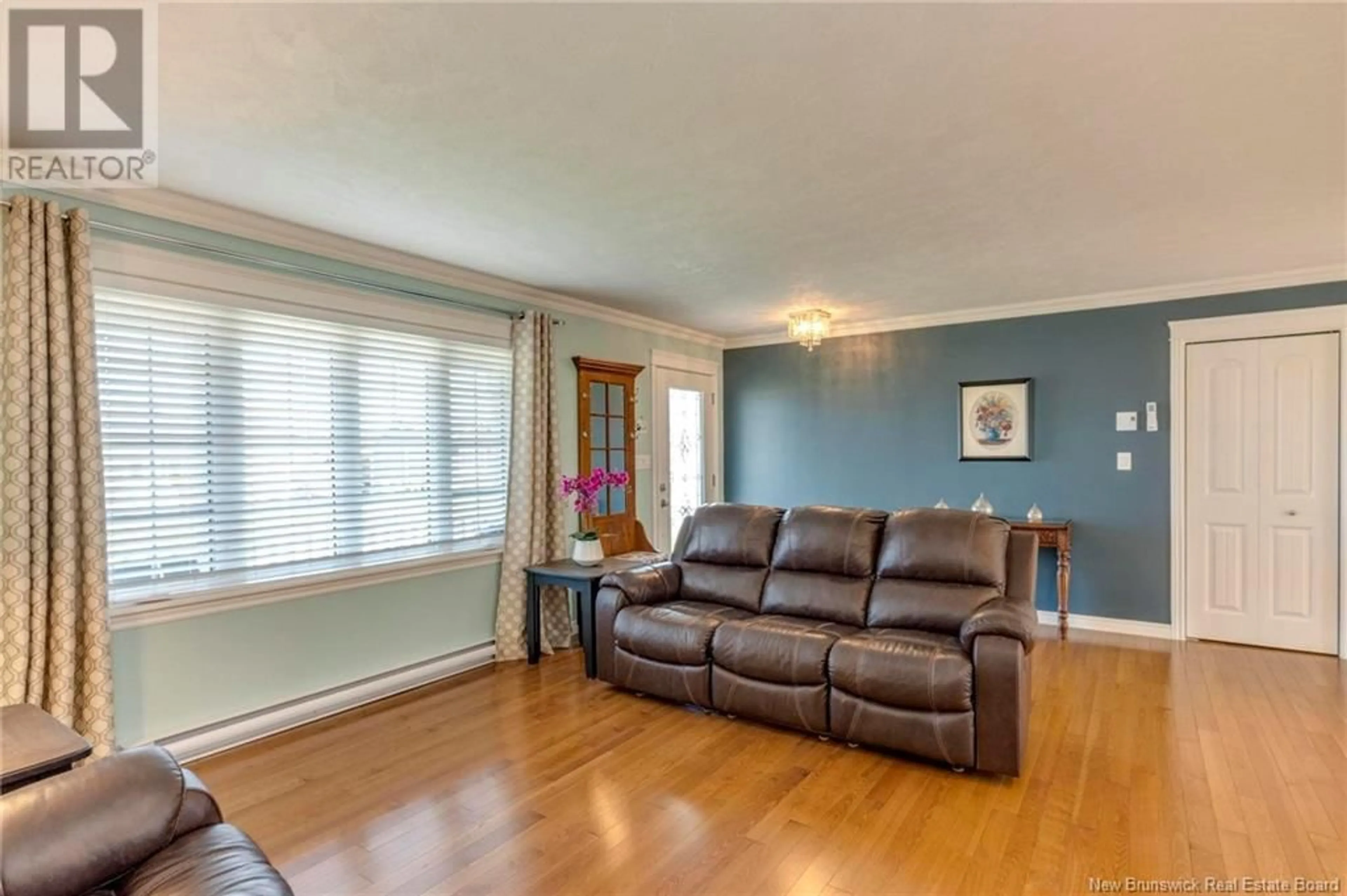 Living room with furniture, wood/laminate floor for 66 SQUIRE AVENUE, Riverview New Brunswick E1B0N2