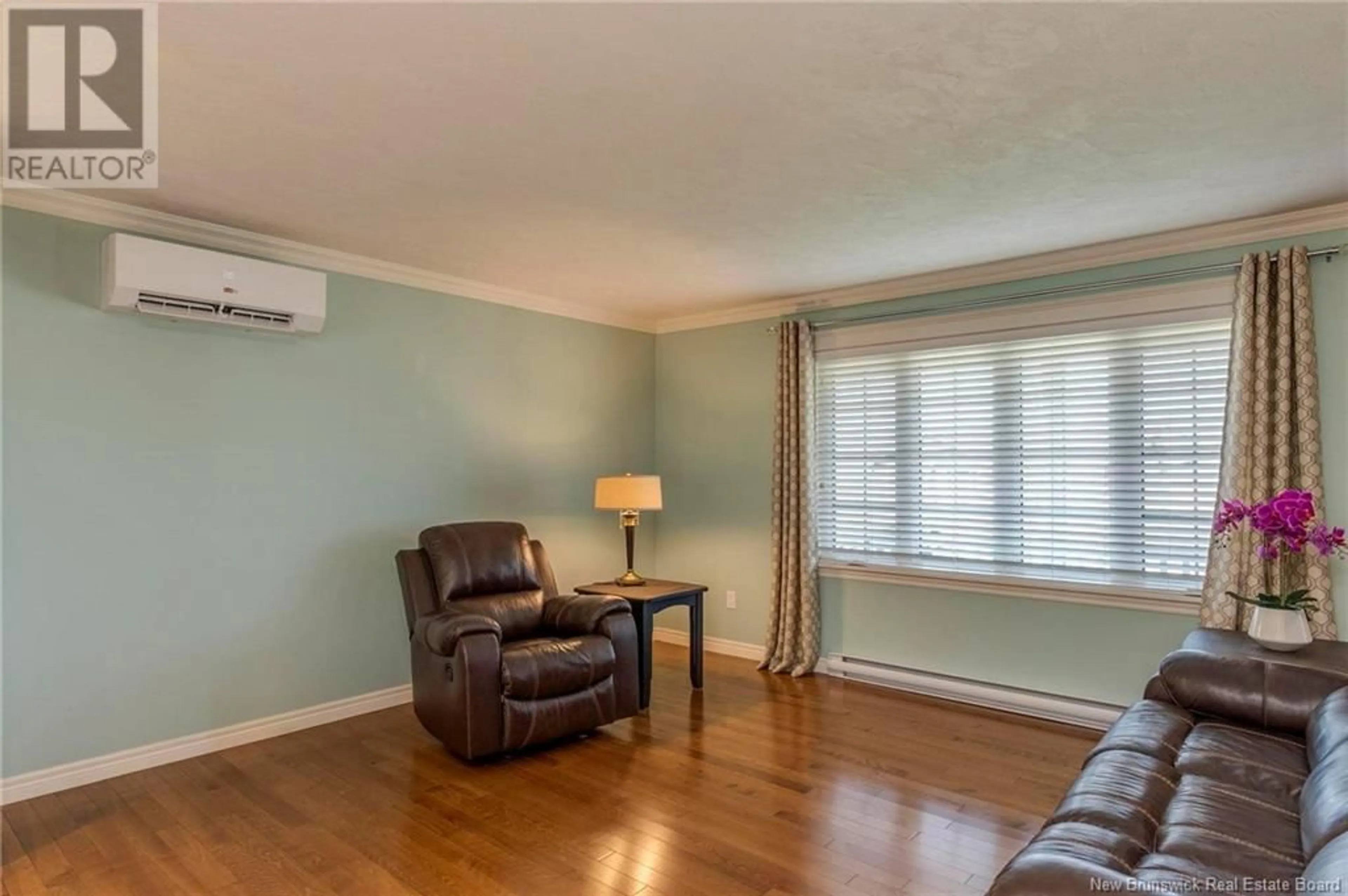 Living room with furniture, wood/laminate floor for 66 SQUIRE AVENUE, Riverview New Brunswick E1B0N2
