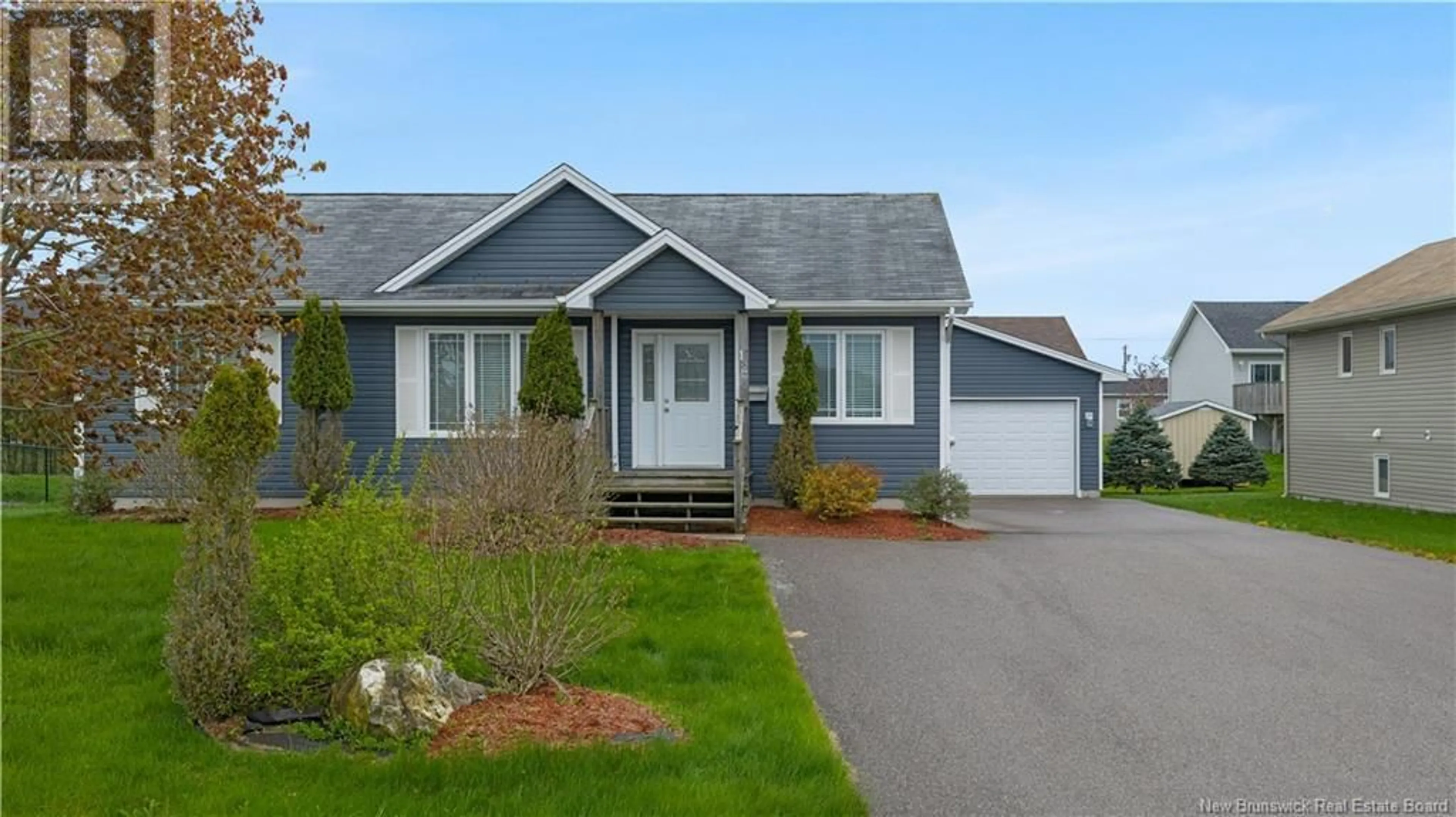 Home with vinyl exterior material, street for 12 LAMDA AVENUE, Saint John New Brunswick E2J0B6