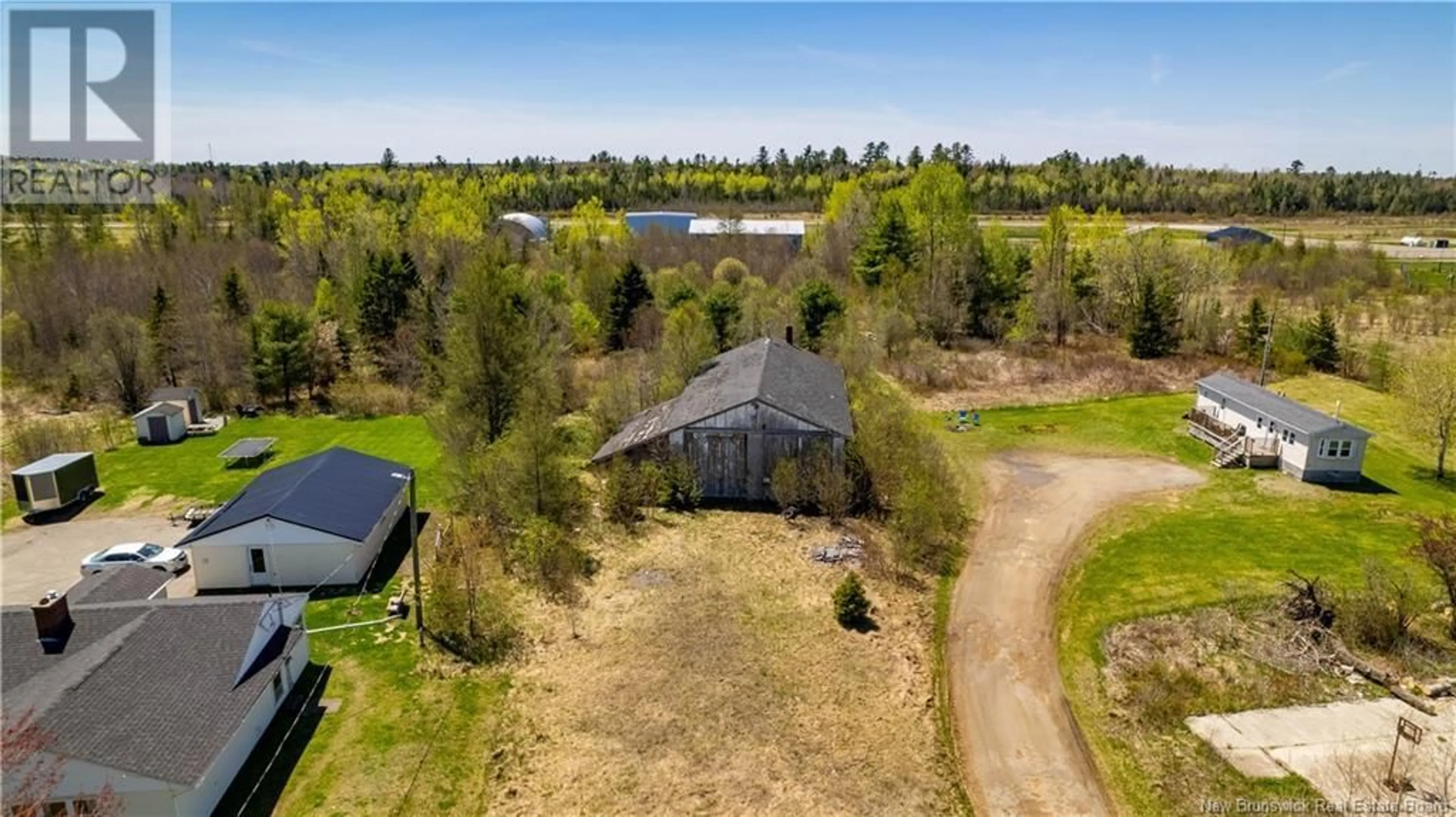 A pic from outside/outdoor area/front of a property/back of a property/a pic from drone, water/lake/river/ocean view for 180 ROUTE 170, Oak Bay New Brunswick E3L3X7