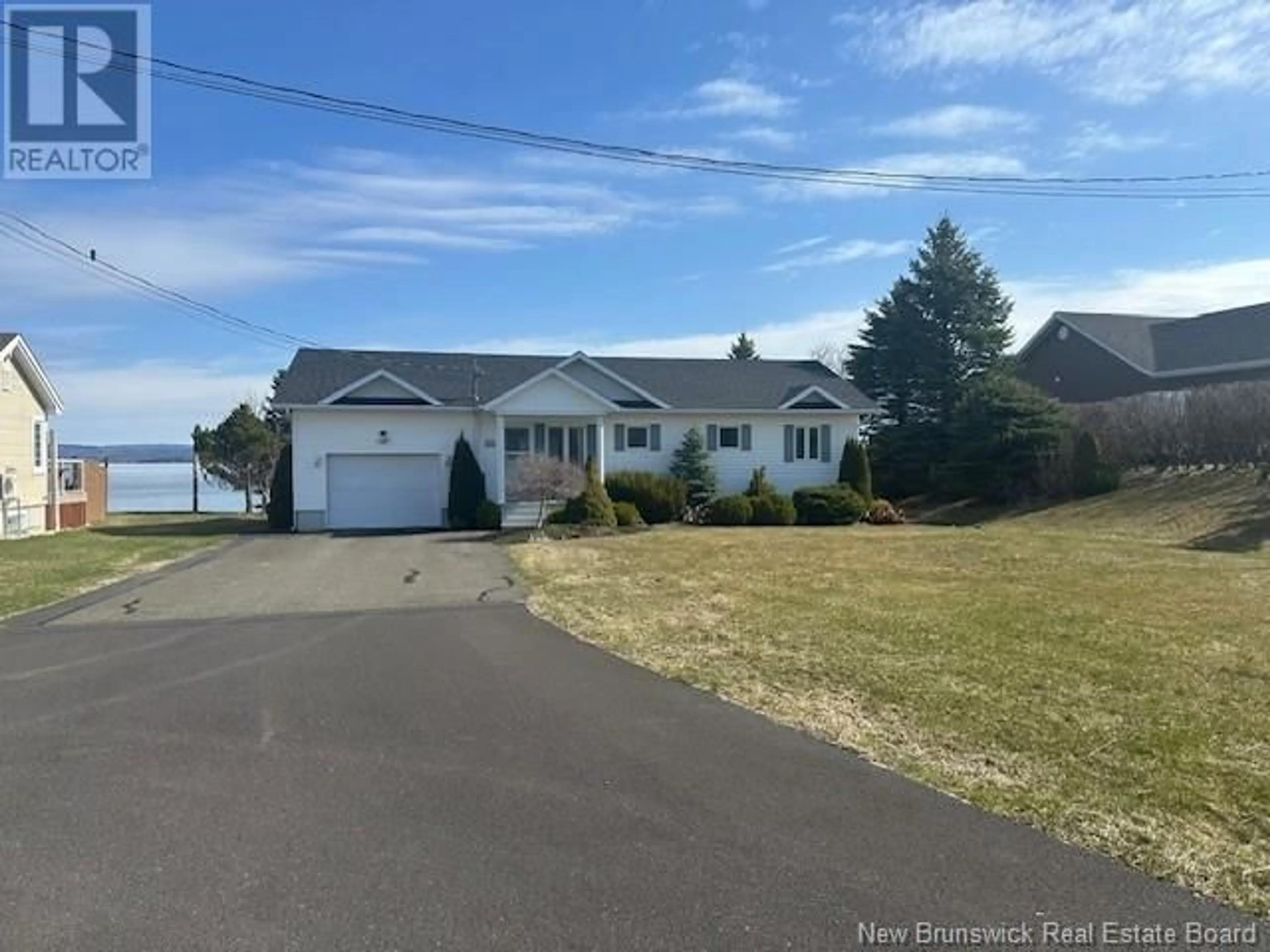 A pic from outside/outdoor area/front of a property/back of a property/a pic from drone, water/lake/river/ocean view for 17 LANE 51, Charlo New Brunswick E8E2X2