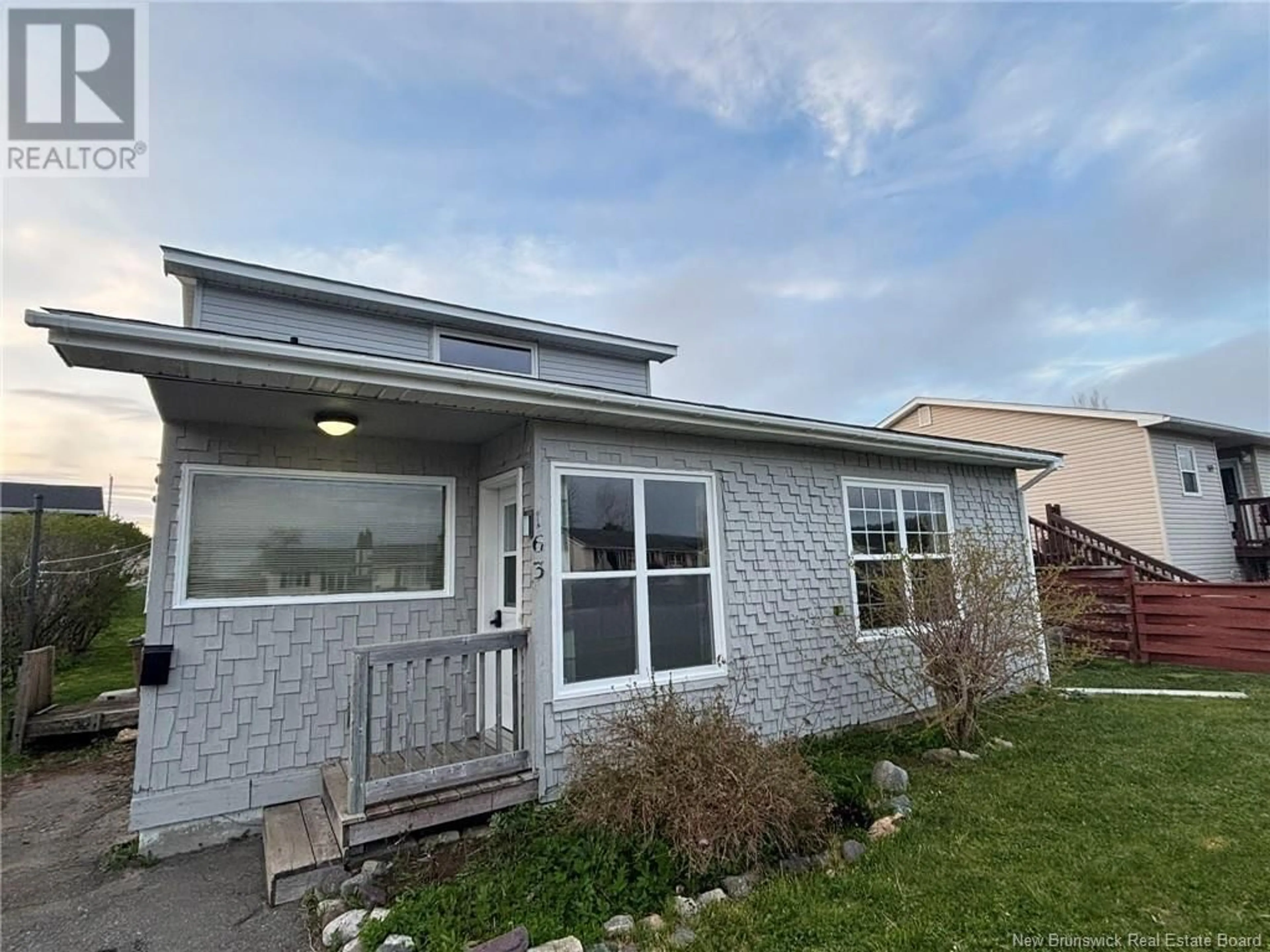 Home with vinyl exterior material, street for 163 OCEAN DRIVE, Saint John New Brunswick E2P1G5