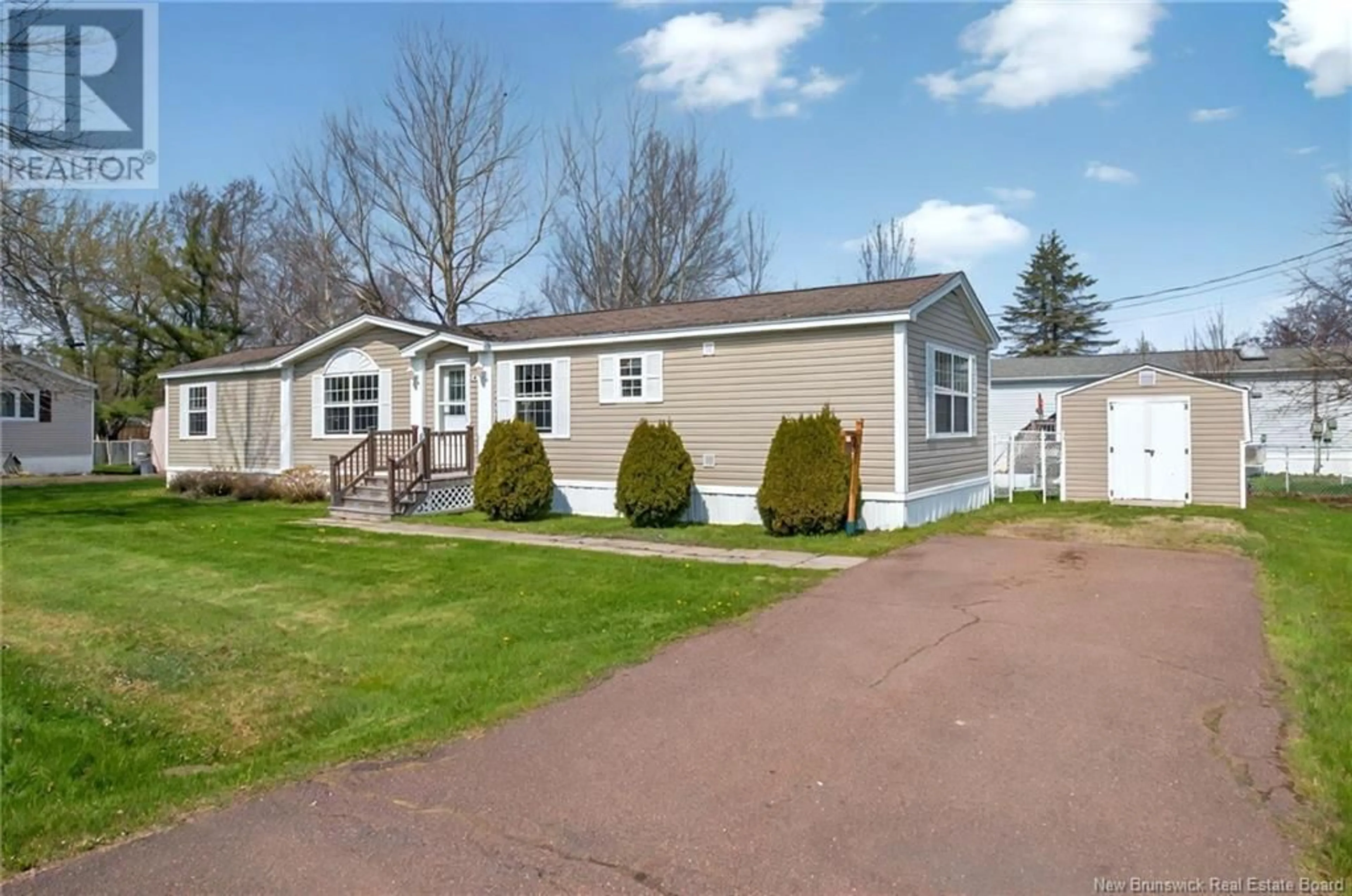 Home with vinyl exterior material, street for 6 BLUE JAY STREET, Moncton New Brunswick E1H2S2