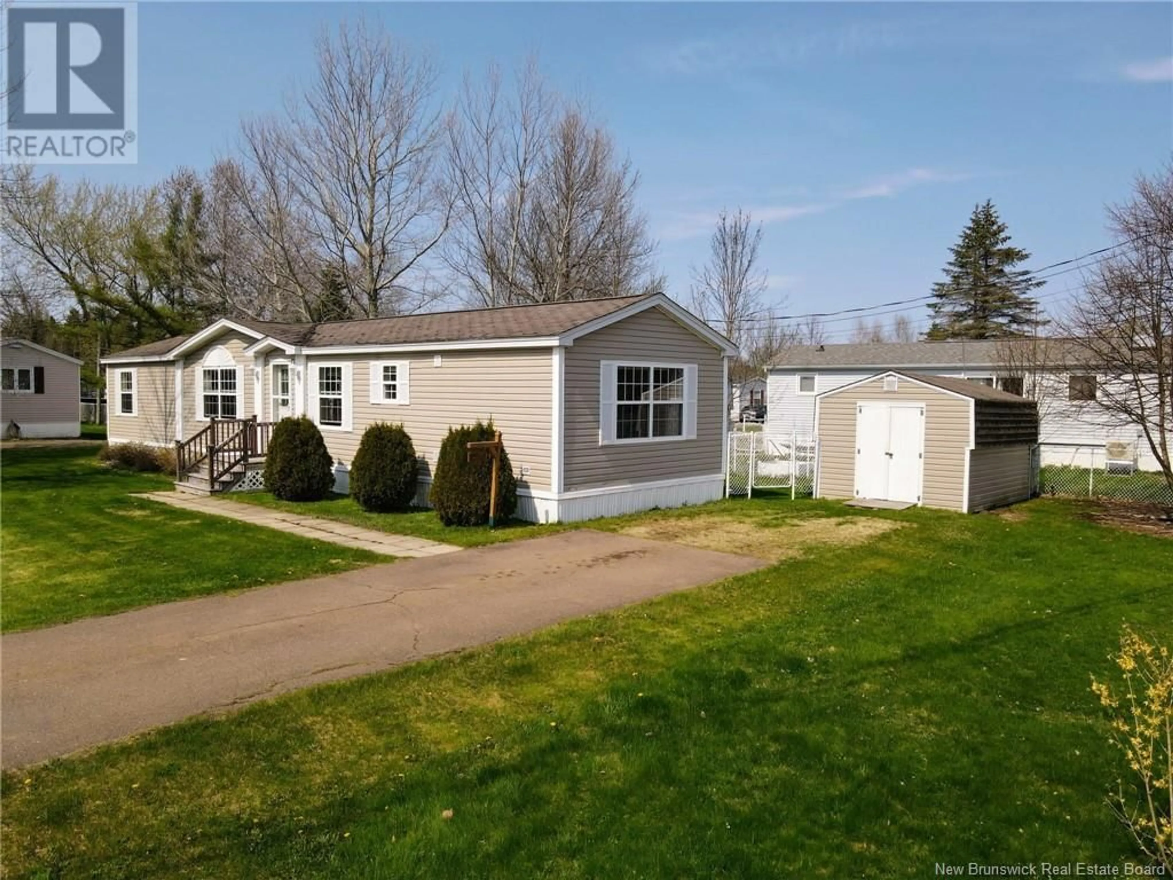 Home with vinyl exterior material, street for 6 BLUE JAY STREET, Moncton New Brunswick E1H2S2
