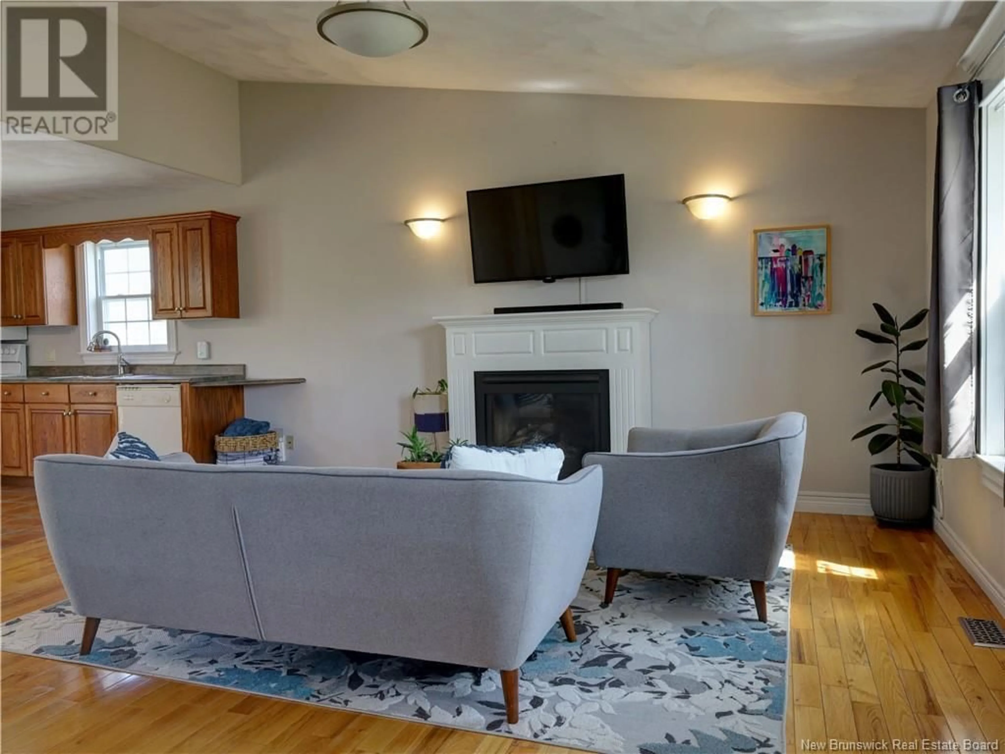 Living room with furniture, unknown for 13 GLEN EYRE COURT, Fredericton New Brunswick E3C2P7