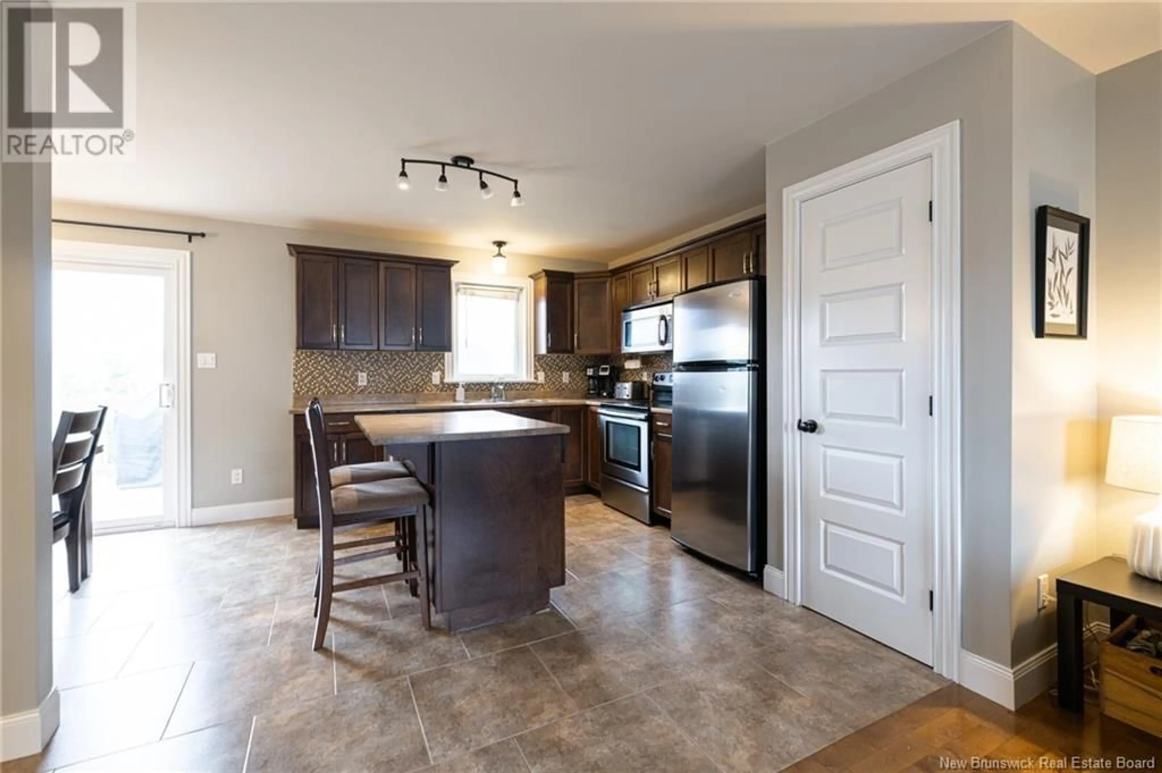 Open concept kitchen, ceramic/tile floor for 11 LANCEFIELD CRESCENT, Moncton New Brunswick E1E0E7